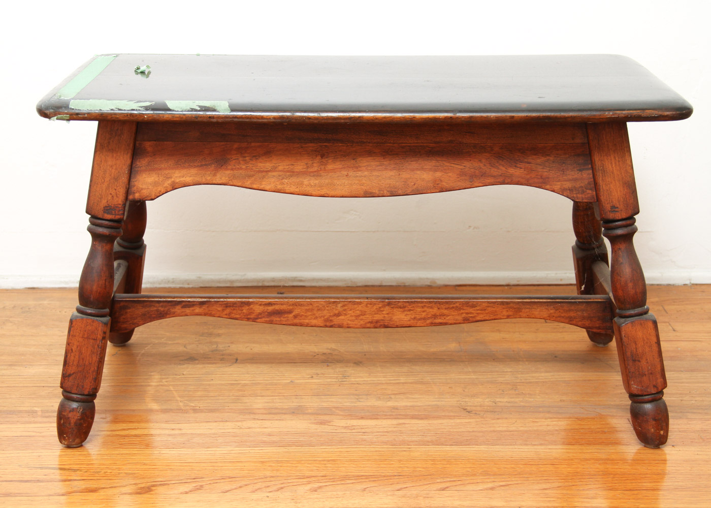 Three Wooden Stools and a Wastebasket