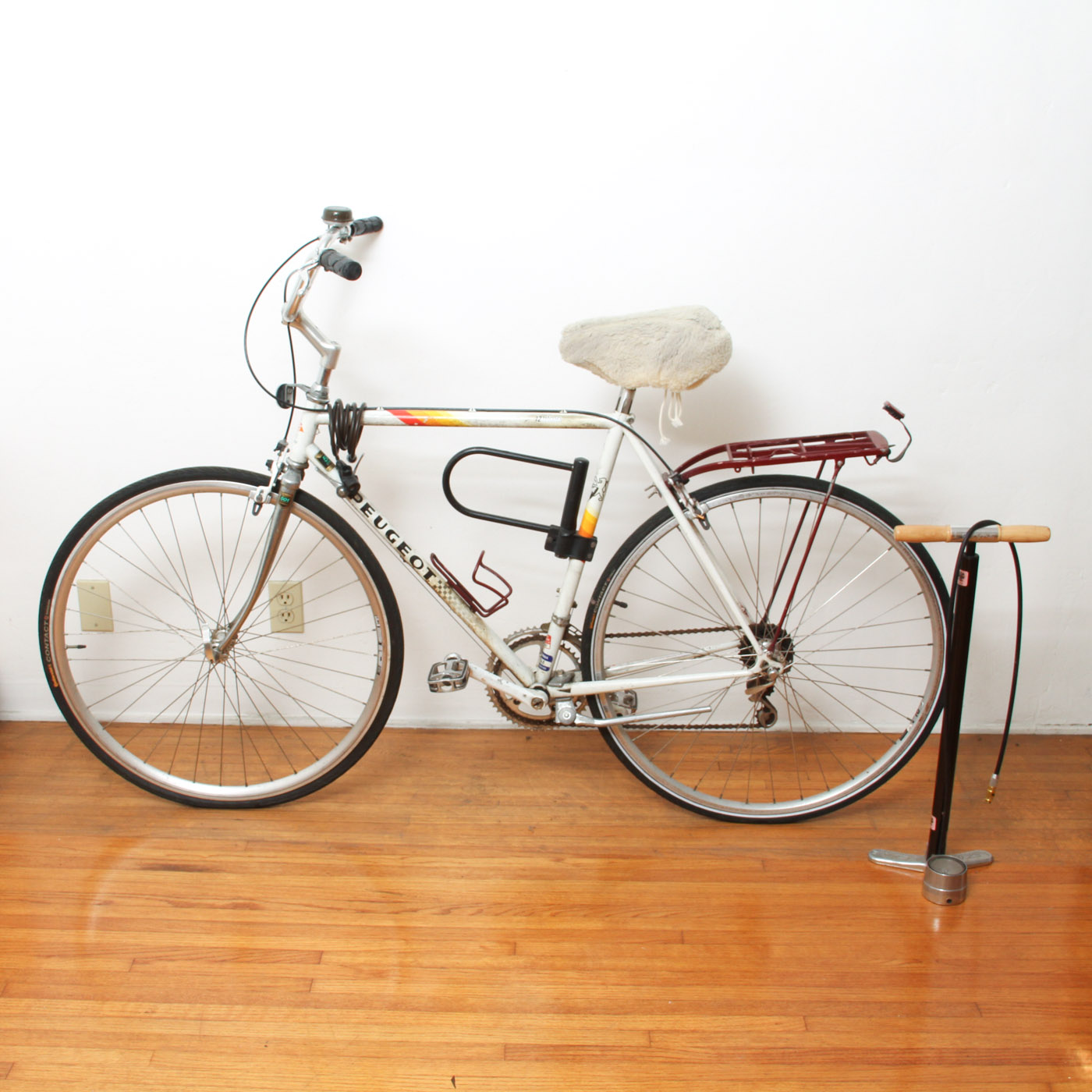 Vintage Peugeot 501 Bicycle  and a leyne pump