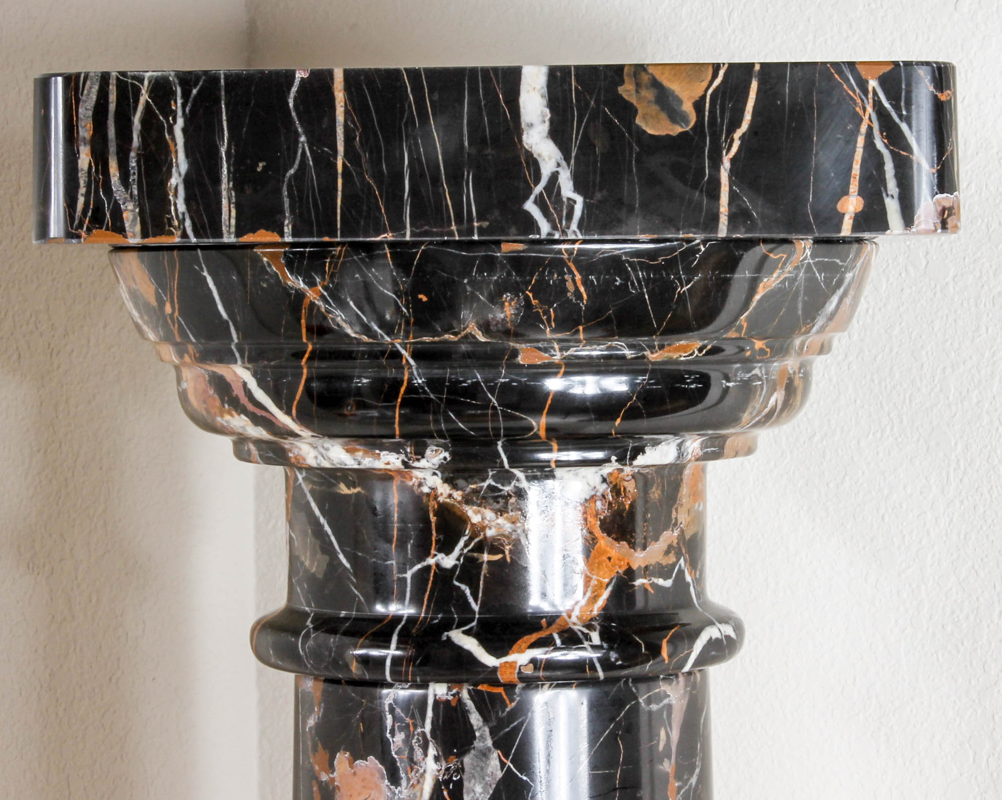 Pair of Black and Brown Marble Pillars
