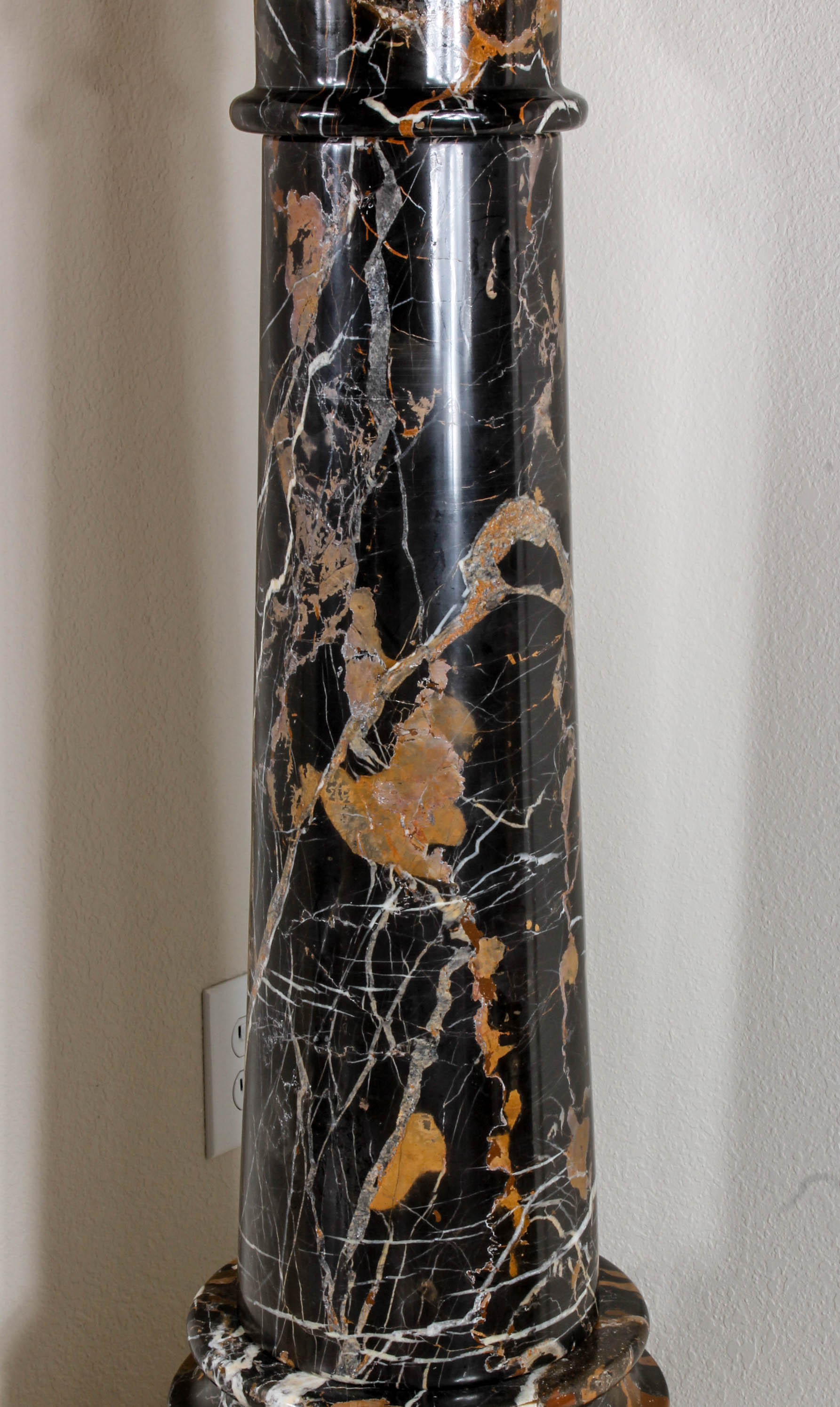 Pair of Black and Brown Marble Pillars
