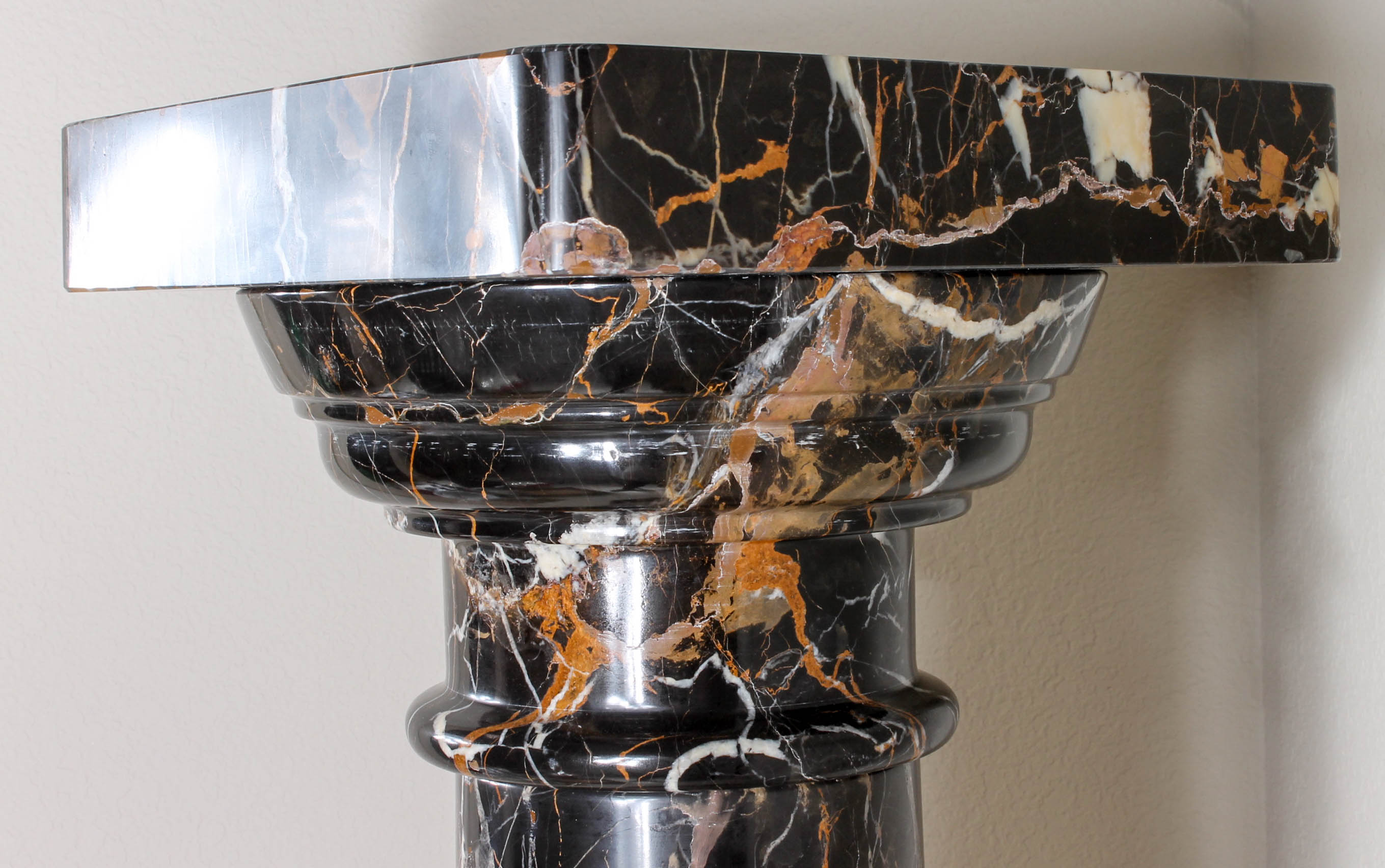 Pair of Black and Brown Marble Pillars