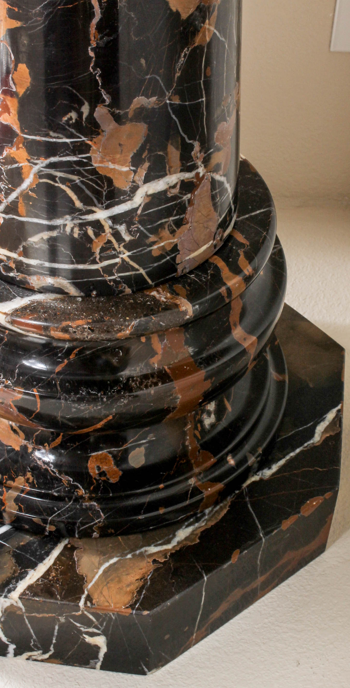 Pair of Black and Brown Marble Pillars