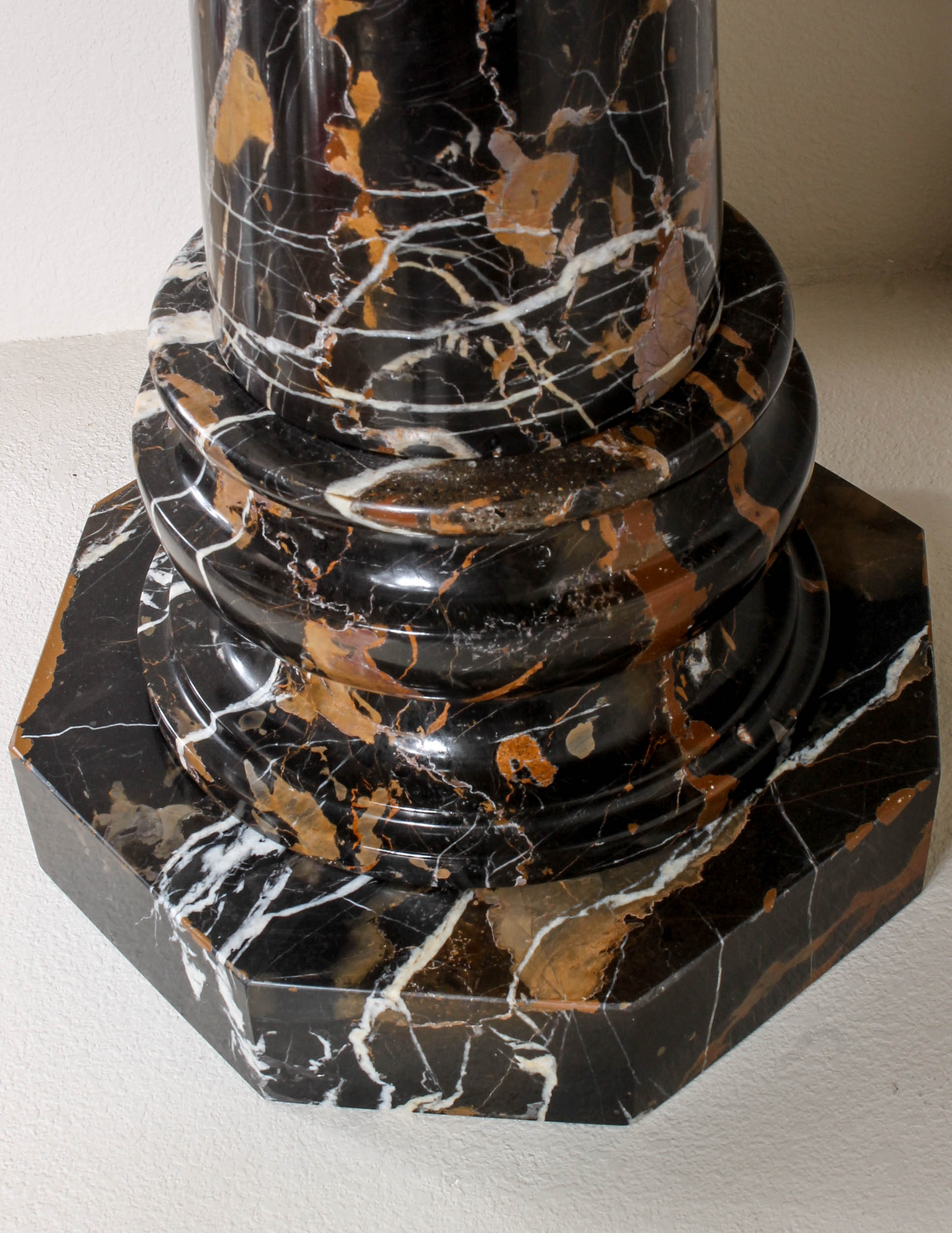 Pair of Black and Brown Marble Pillars