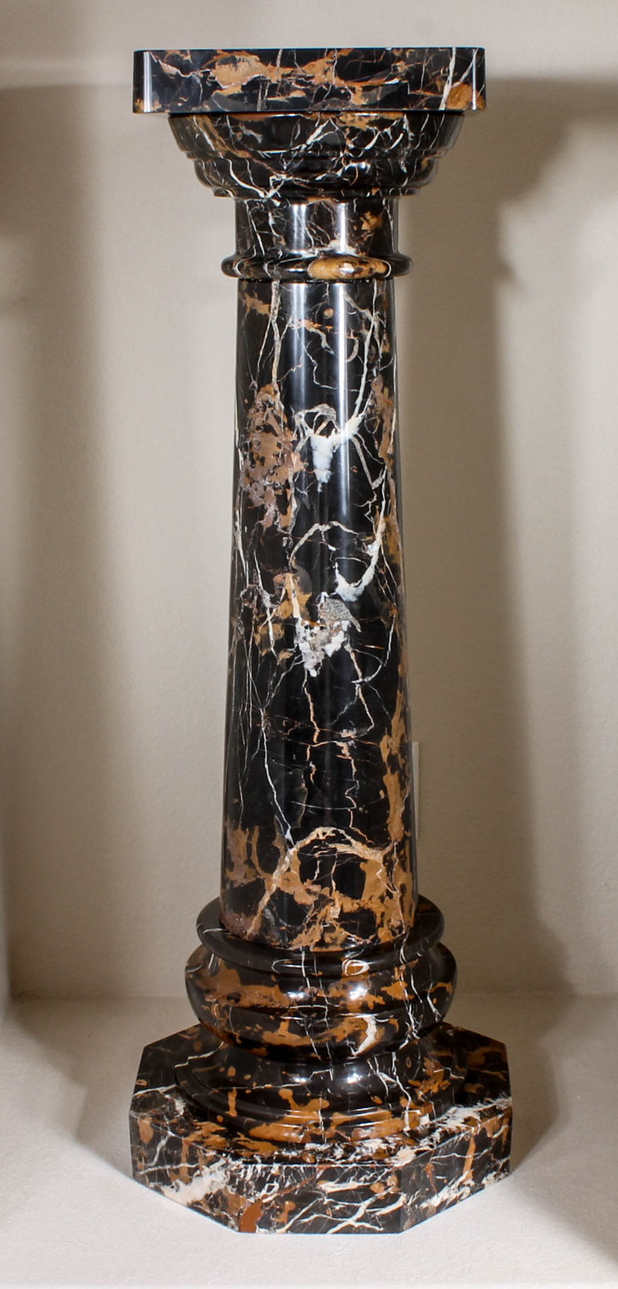 Pair of Black and Brown Marble Pillars