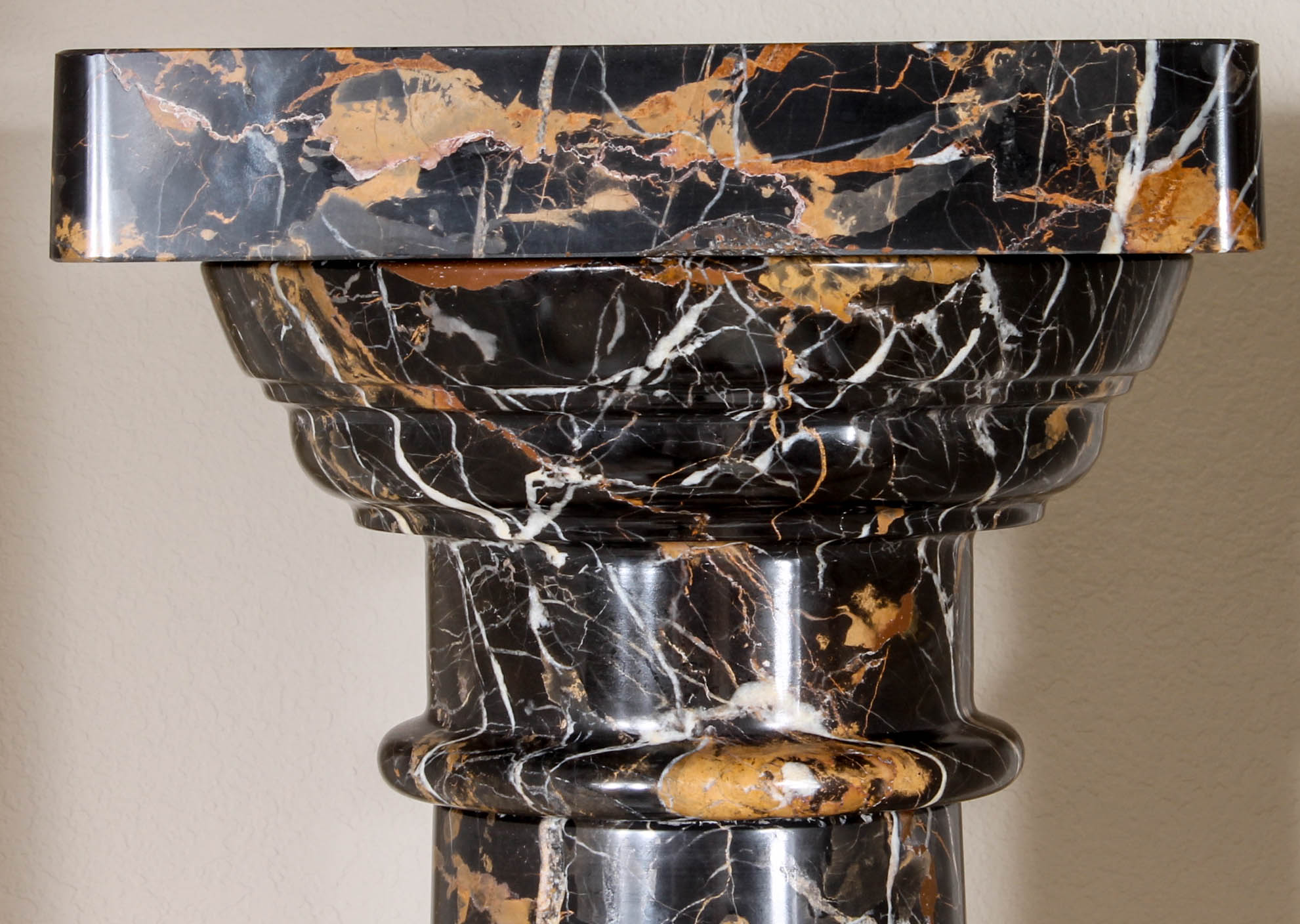 Pair of Black and Brown Marble Pillars