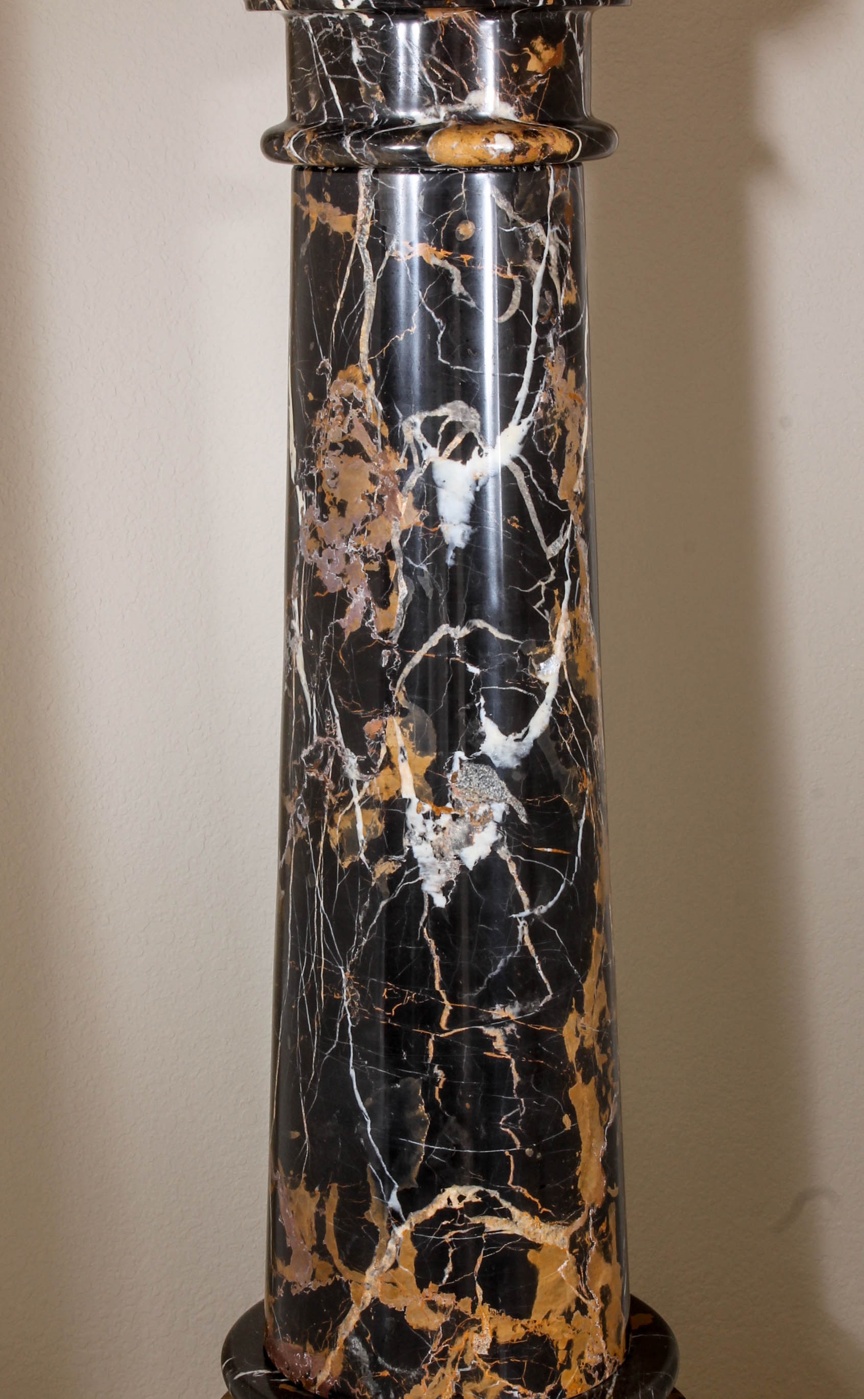 Pair of Black and Brown Marble Pillars