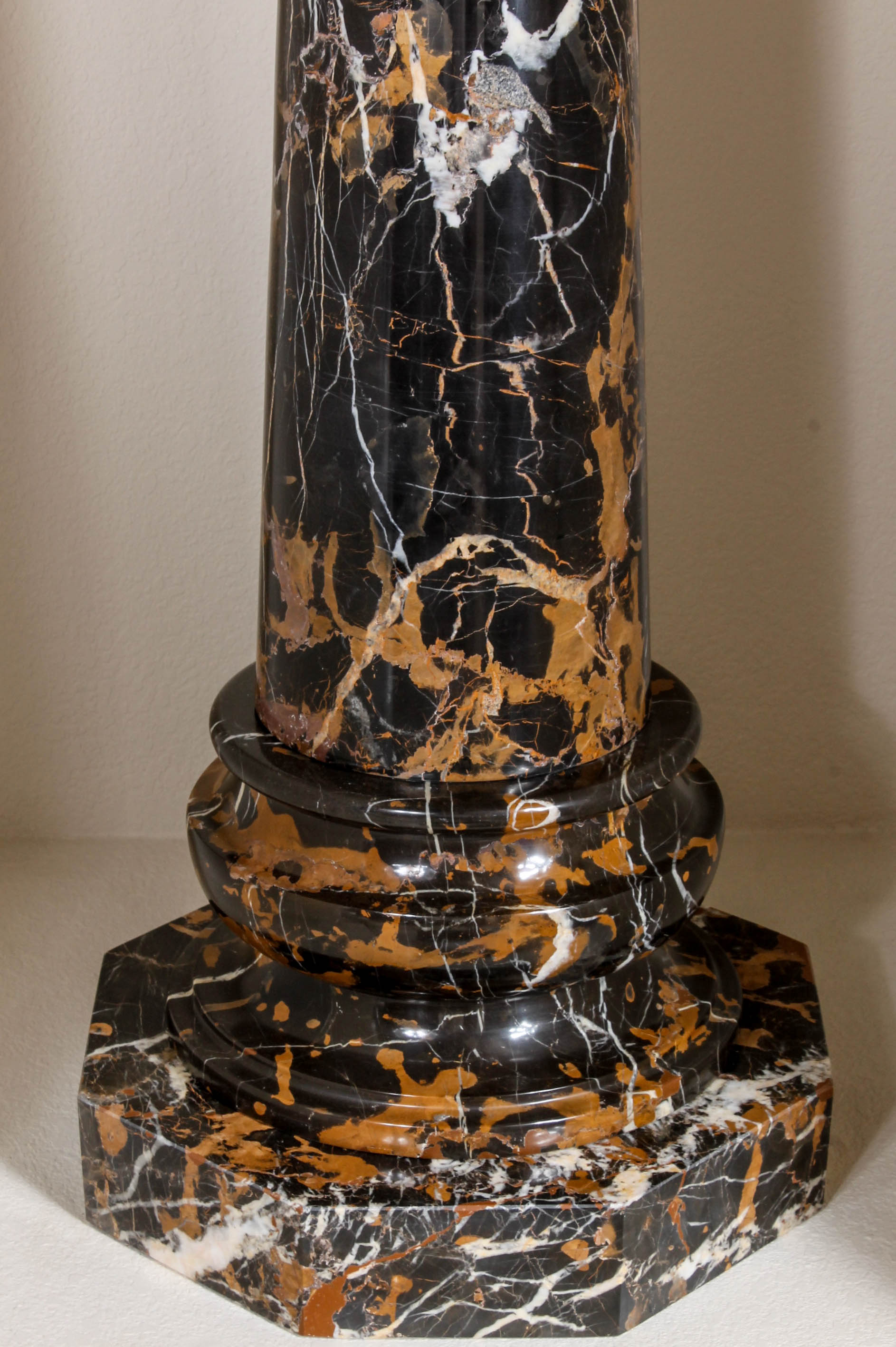 Pair of Black and Brown Marble Pillars