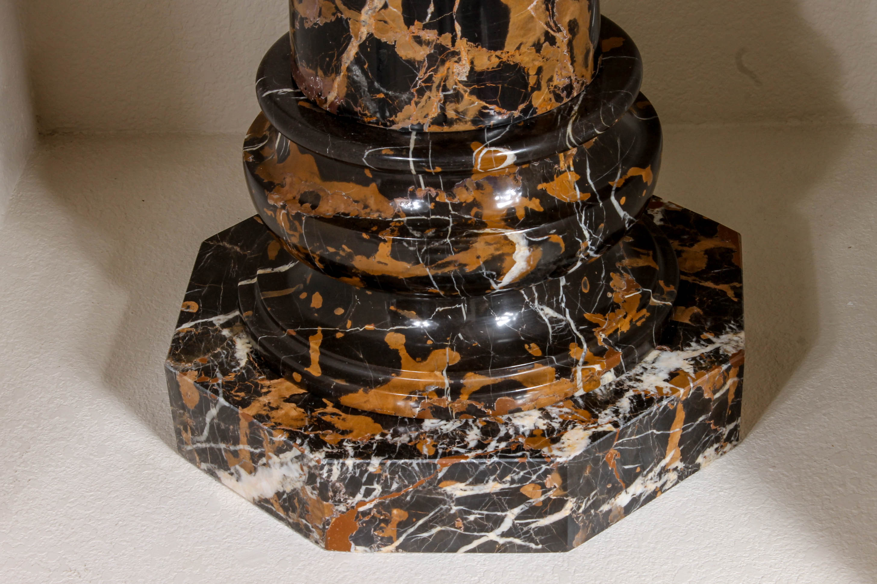 Pair of Black and Brown Marble Pillars