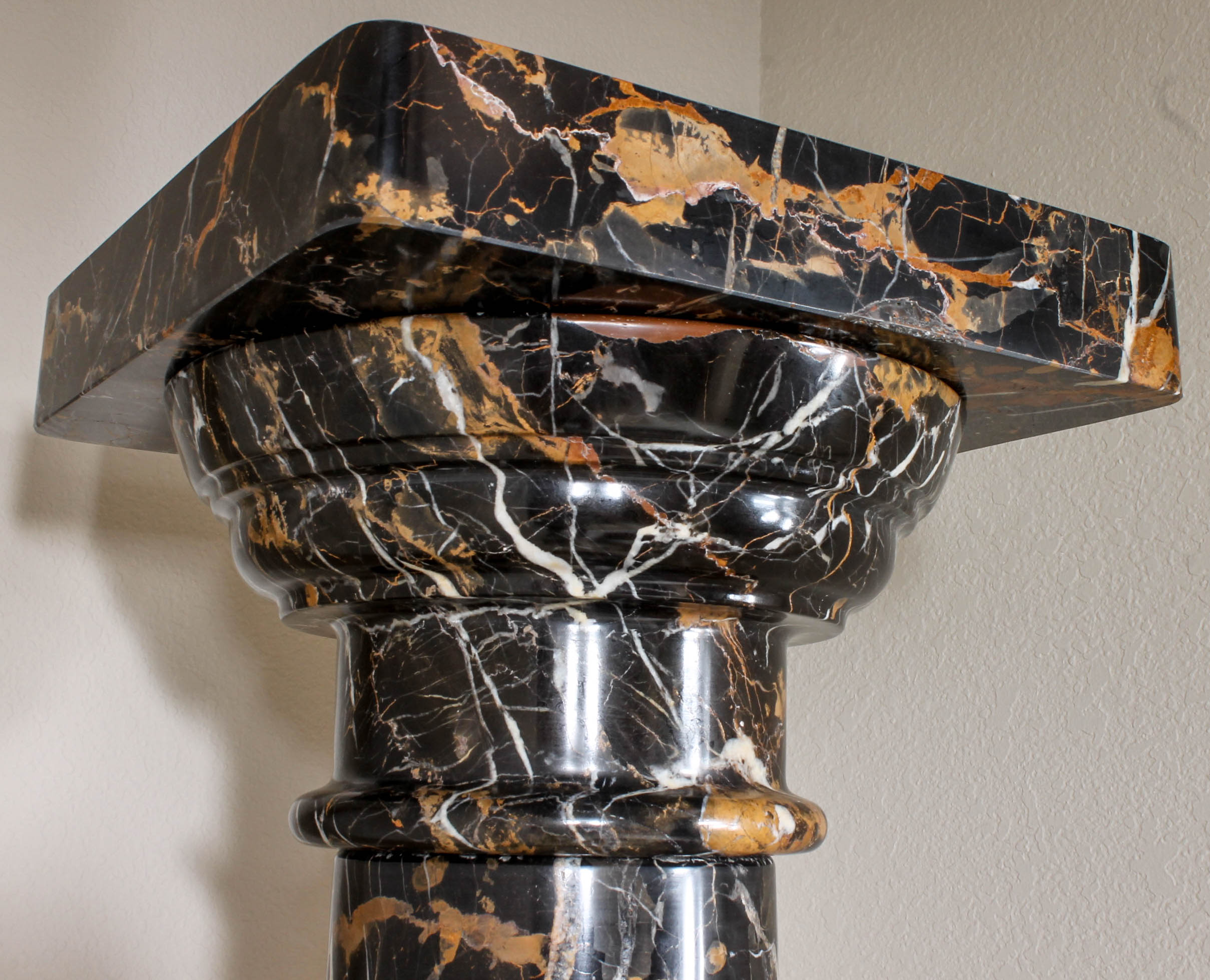 Pair of Black and Brown Marble Pillars
