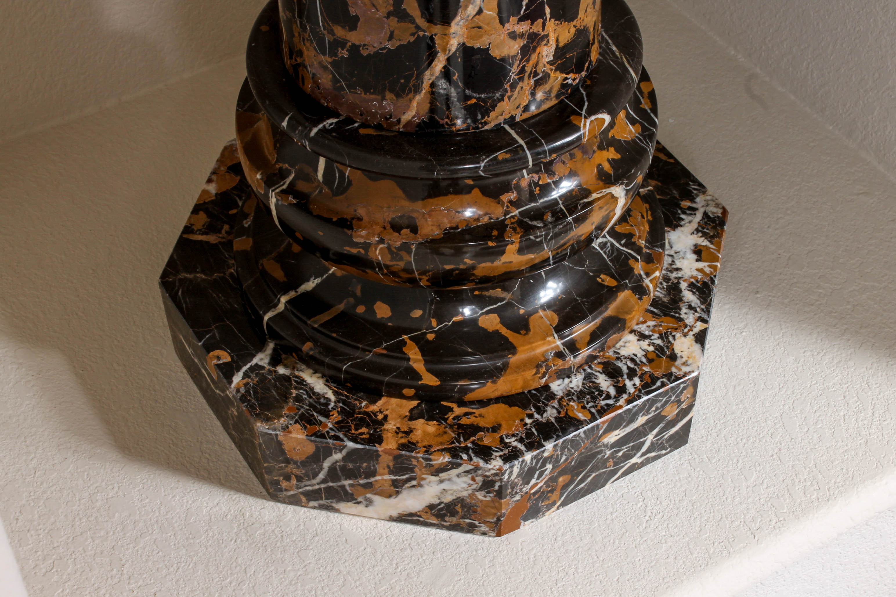 Pair of Black and Brown Marble Pillars