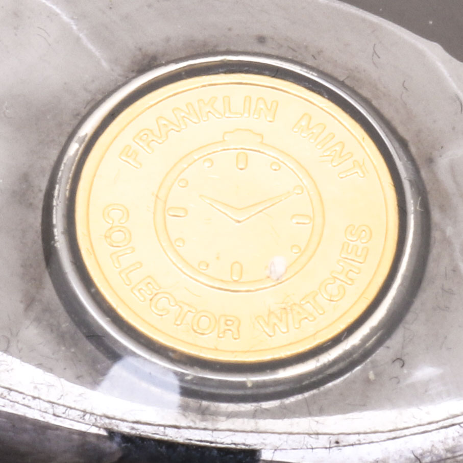 Collection of Franklin Mint Collector Pocket Watches Featuring Wolf Motifs with Display Box