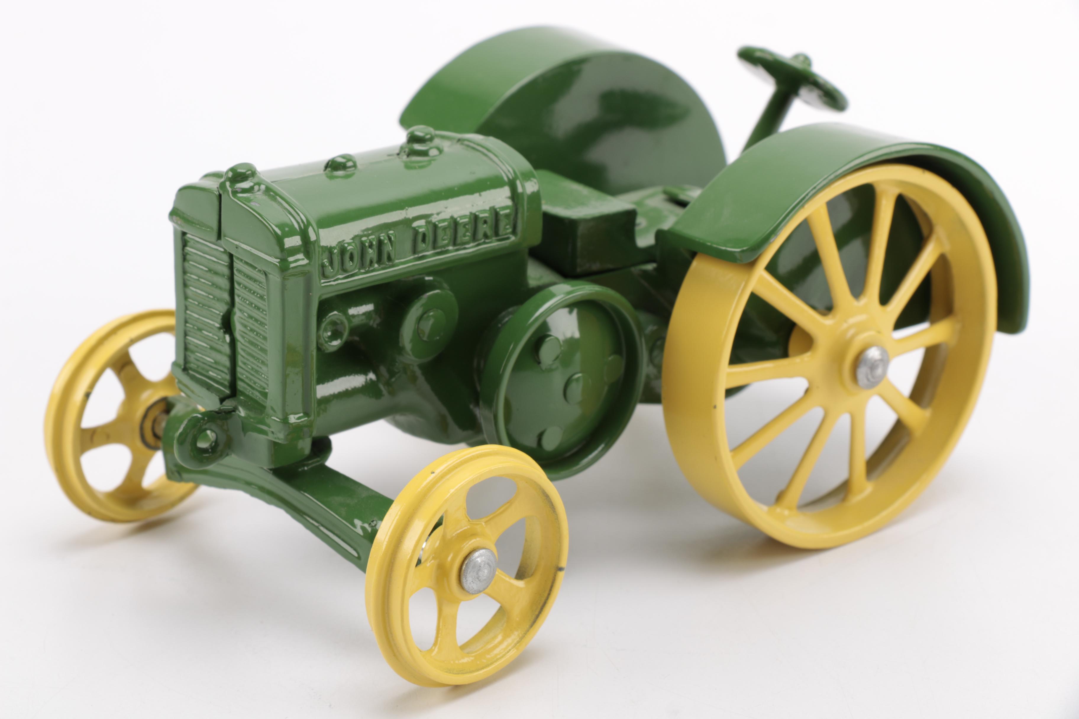 Pair of Metal Tractor Figurines