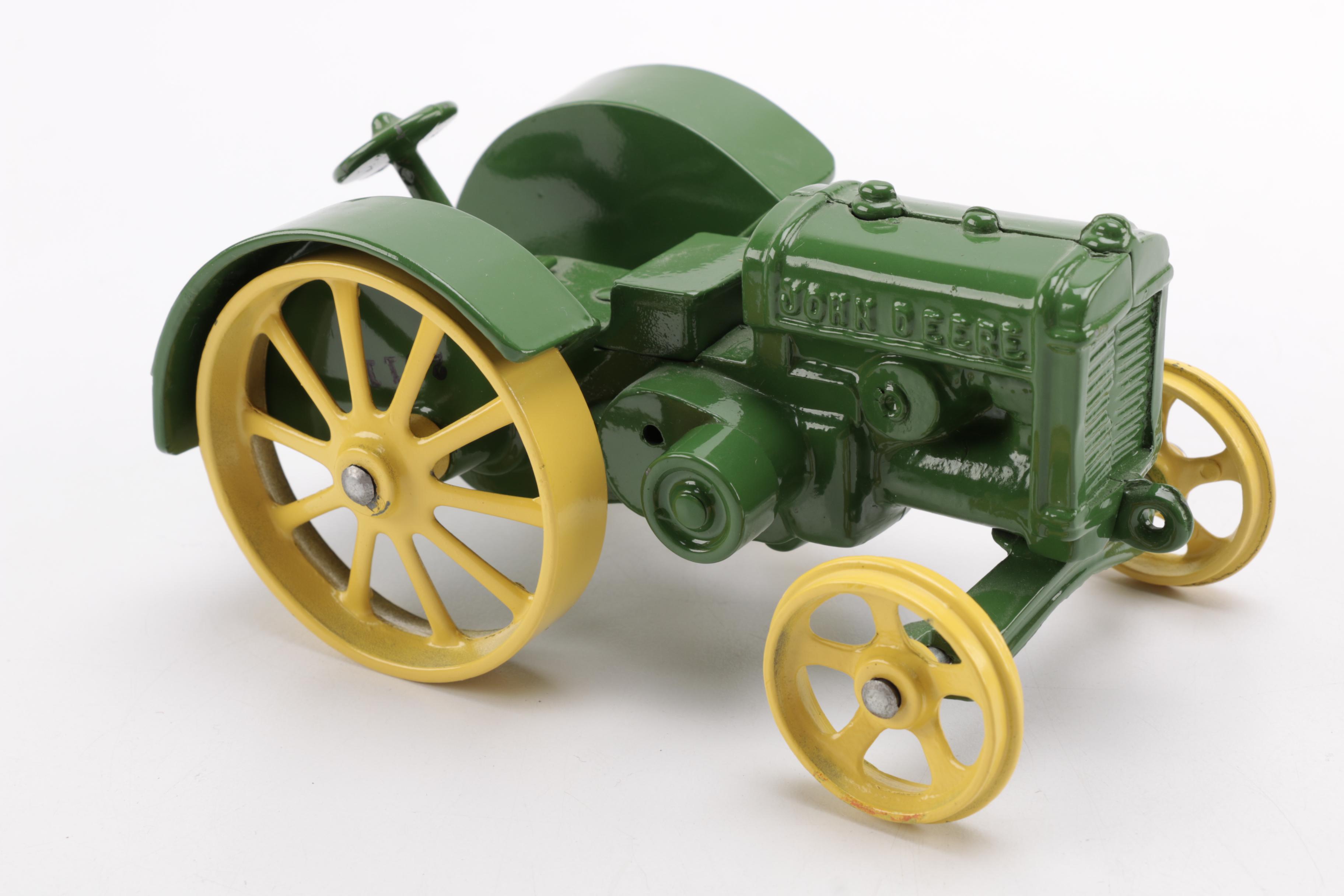Pair of Metal Tractor Figurines