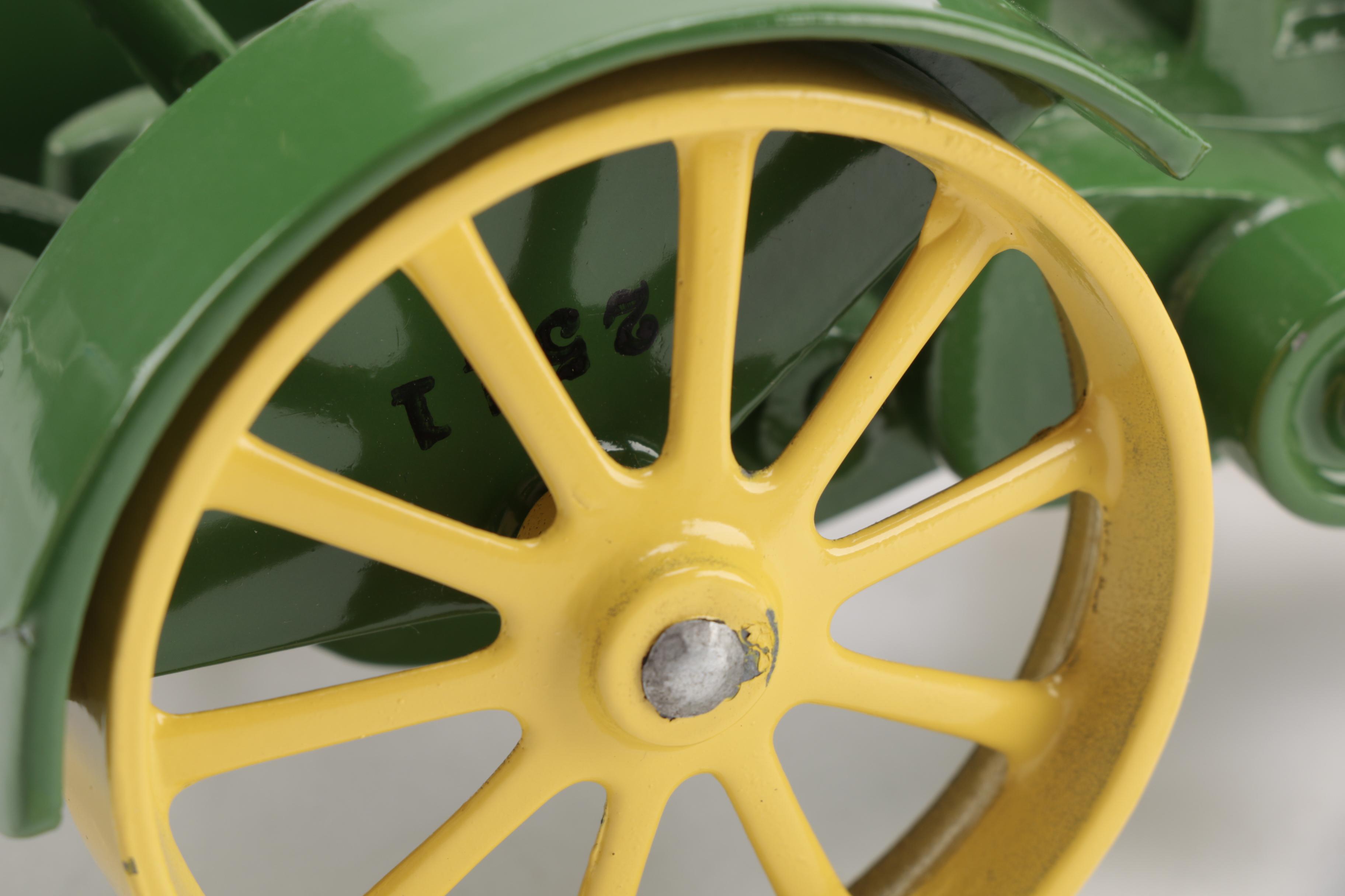 Pair of Metal Tractor Figurines