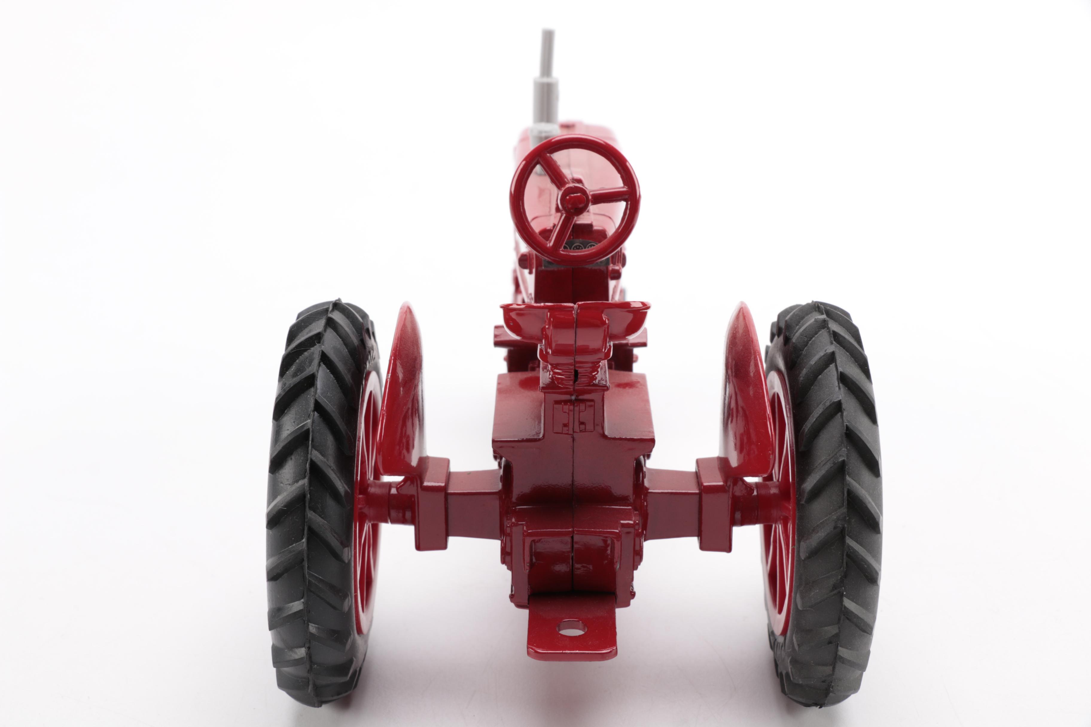 Pair of Metal Tractor Figurines