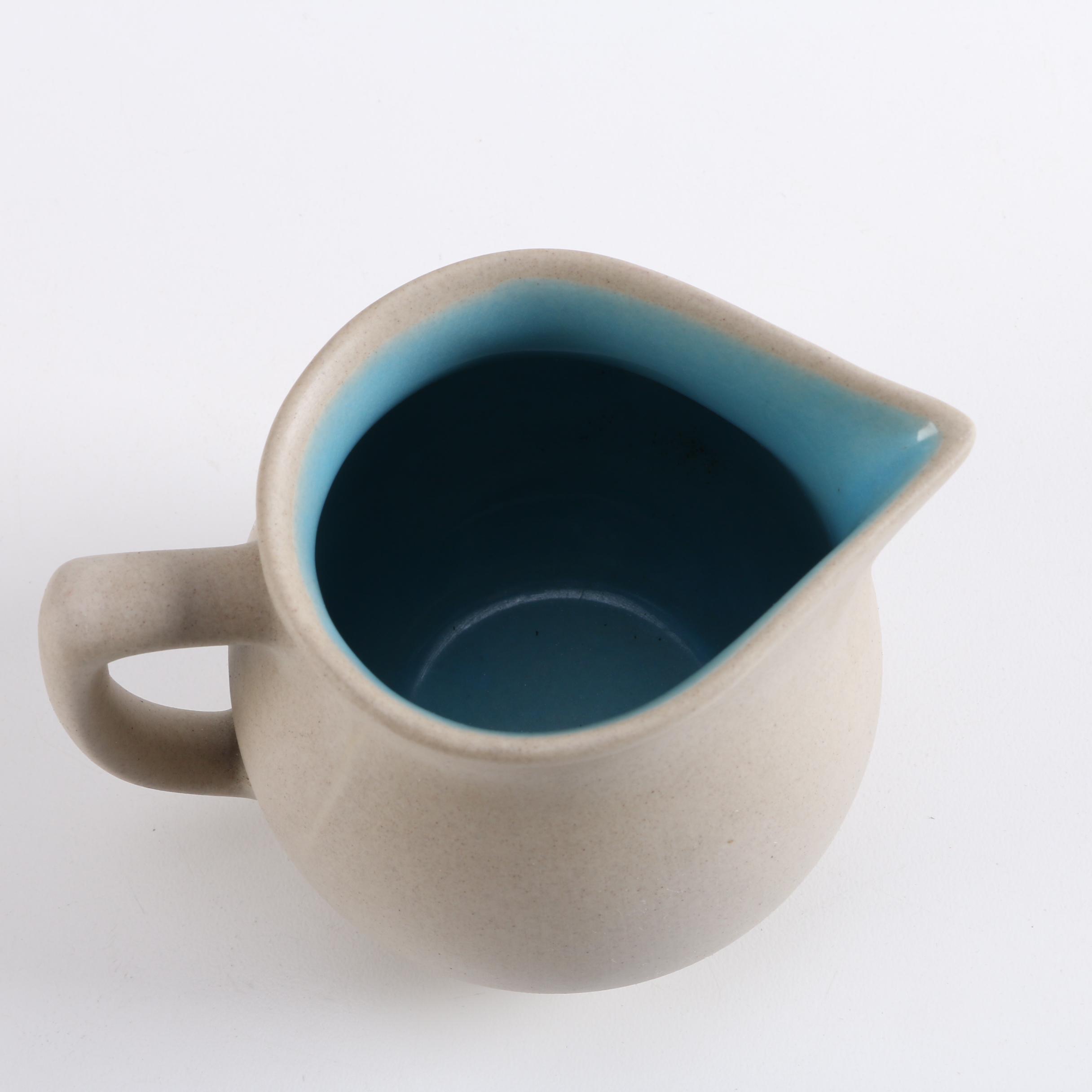 The Pigeon Forge Pottery and Pisgah Forest Pottery Pitchers