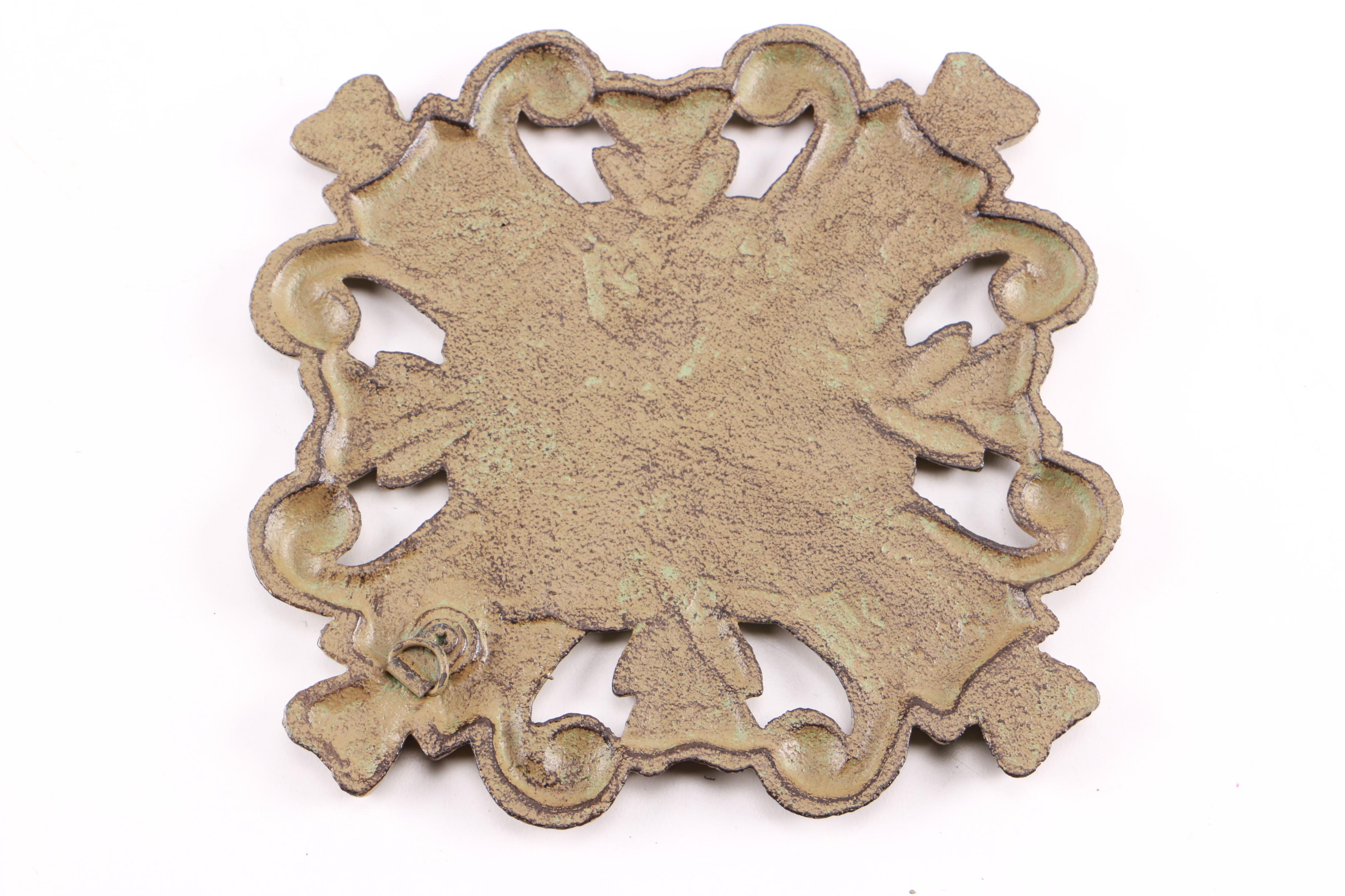 Four Decorative Cast Iron Trivets