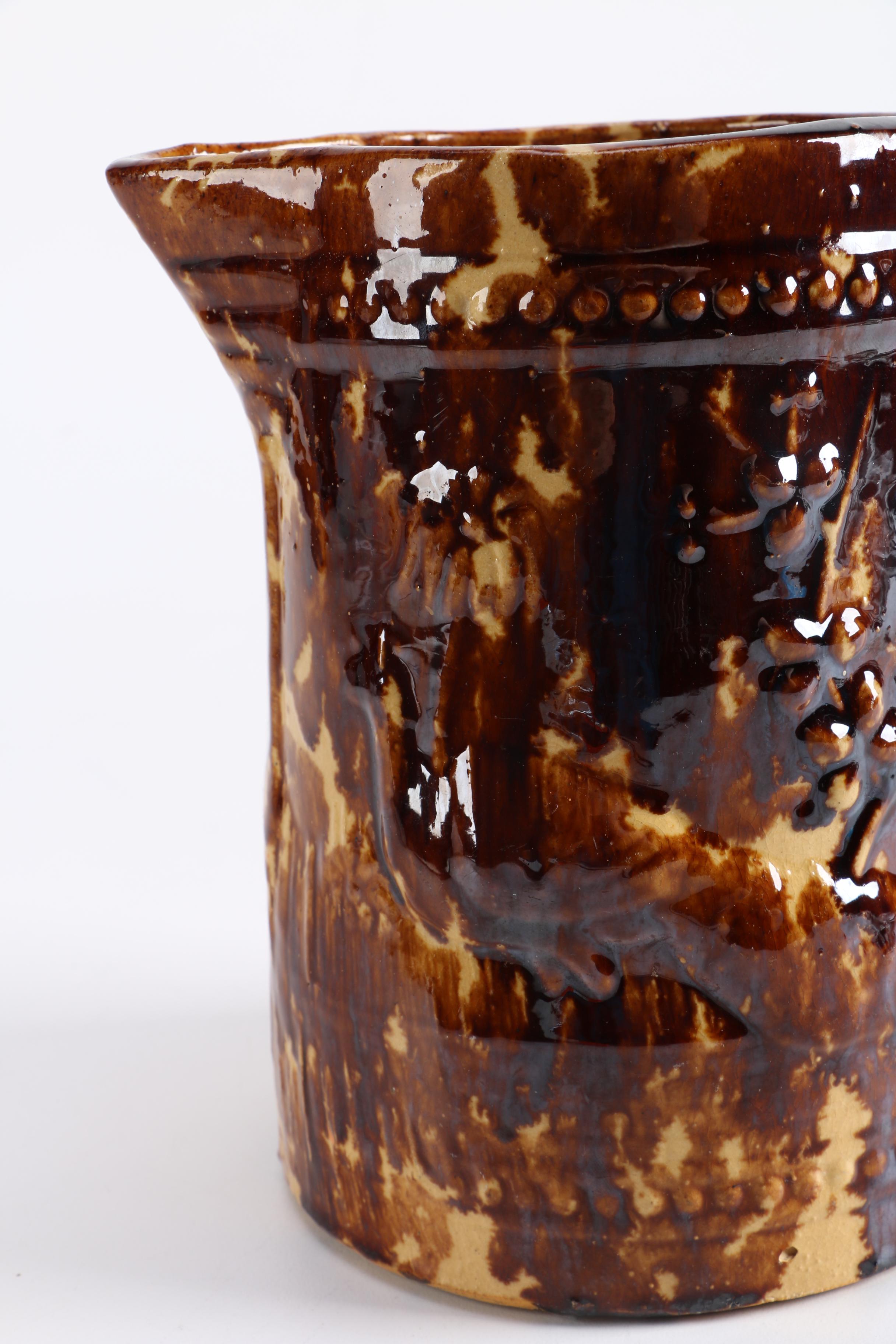 Antique Yellowware Jug With a Rockingham Glaze