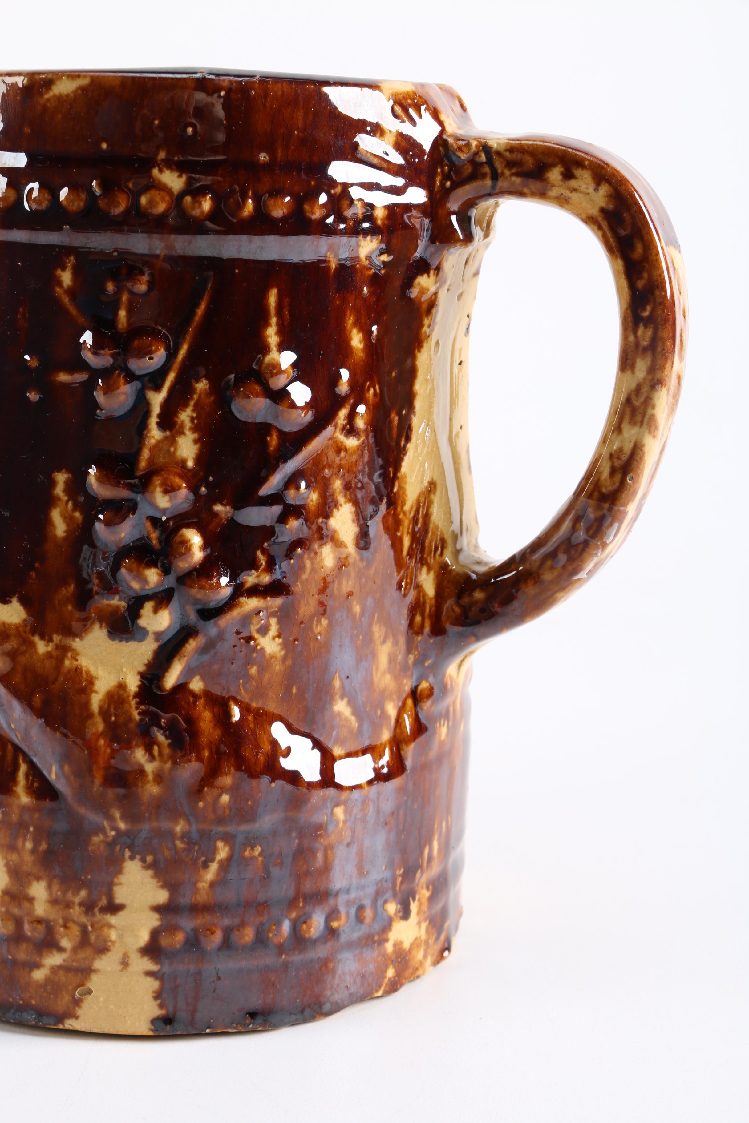 Antique Yellowware Jug With a Rockingham Glaze