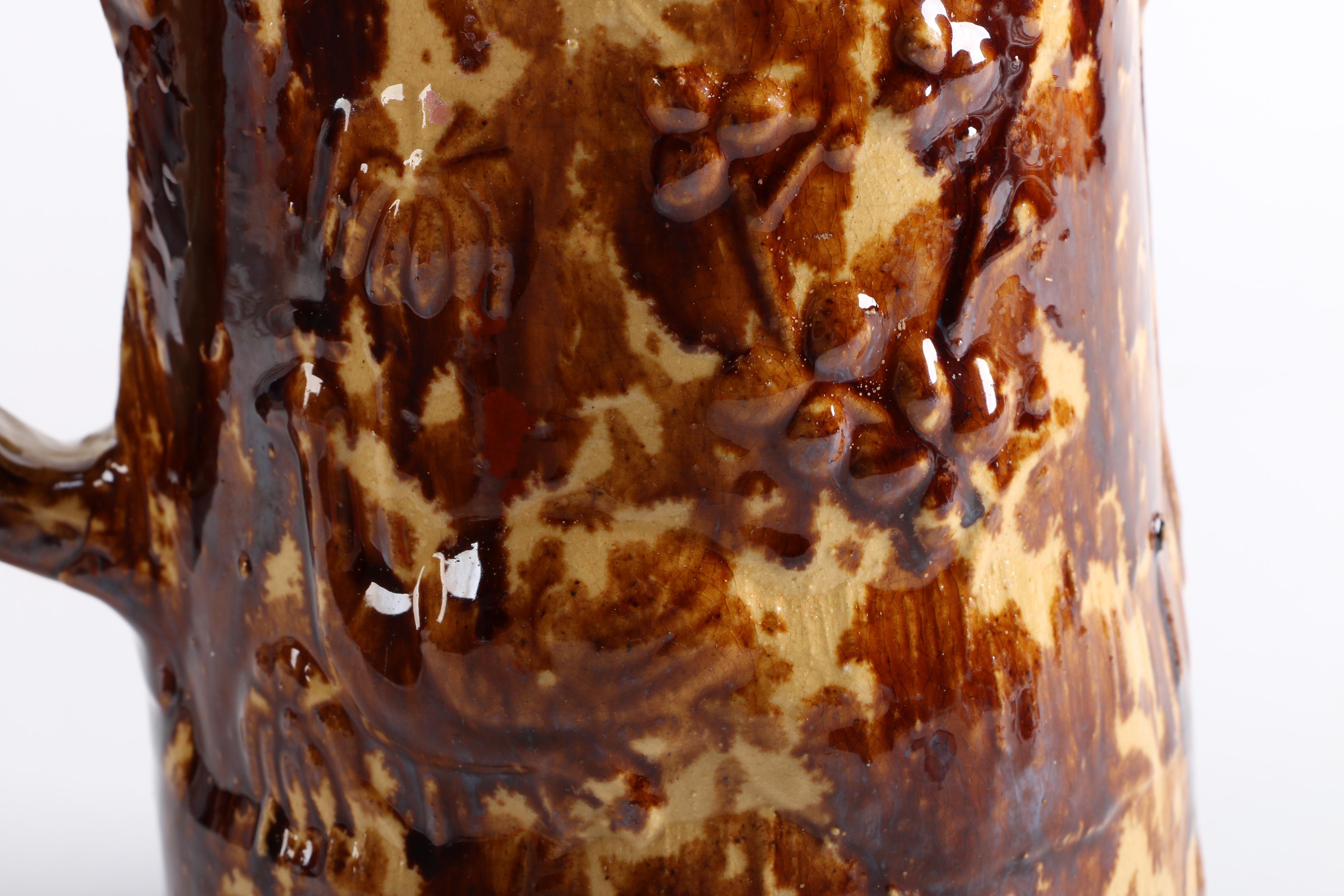 Antique Yellowware Jug With a Rockingham Glaze
