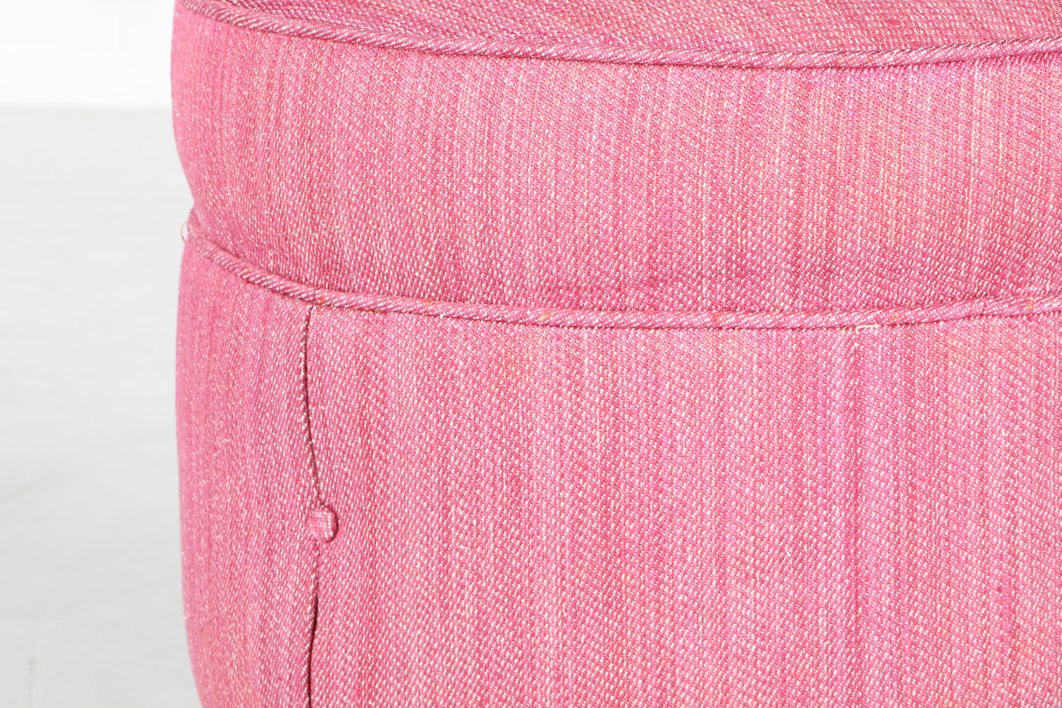 Round Pink-Upholstered Ottoman