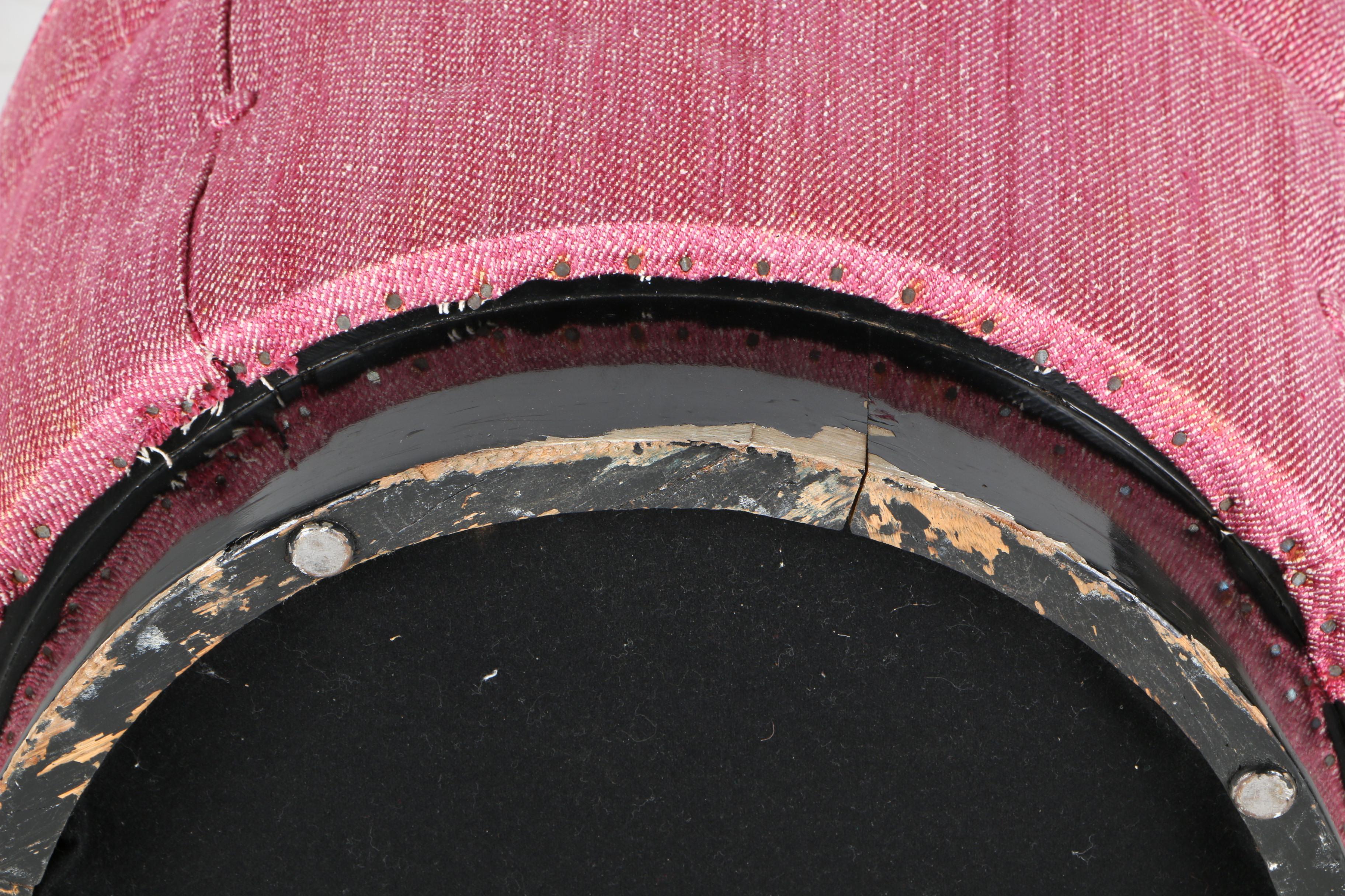 Round Pink-Upholstered Ottoman