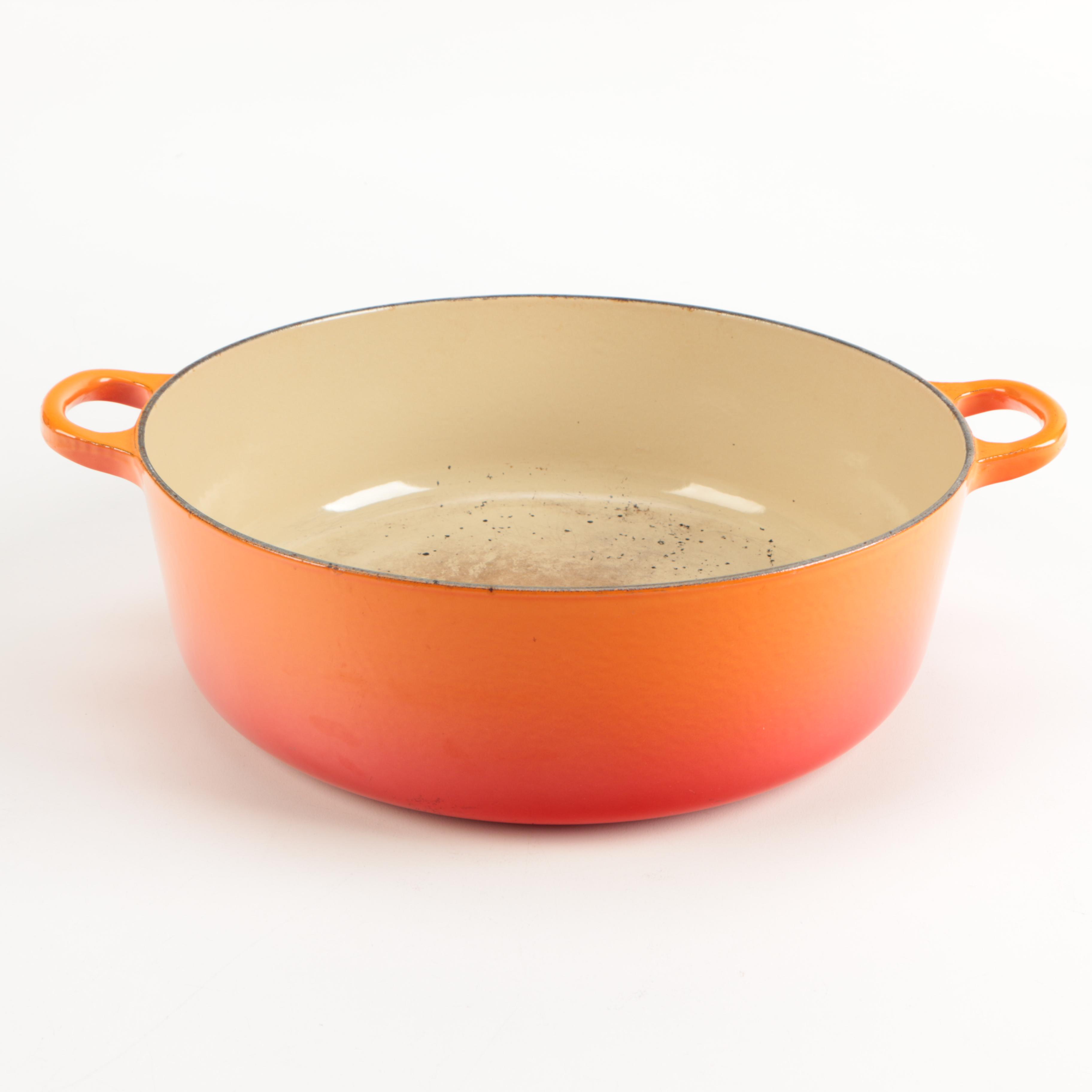 Pair of Le Creuset Orange Enamel Dutch Ovens