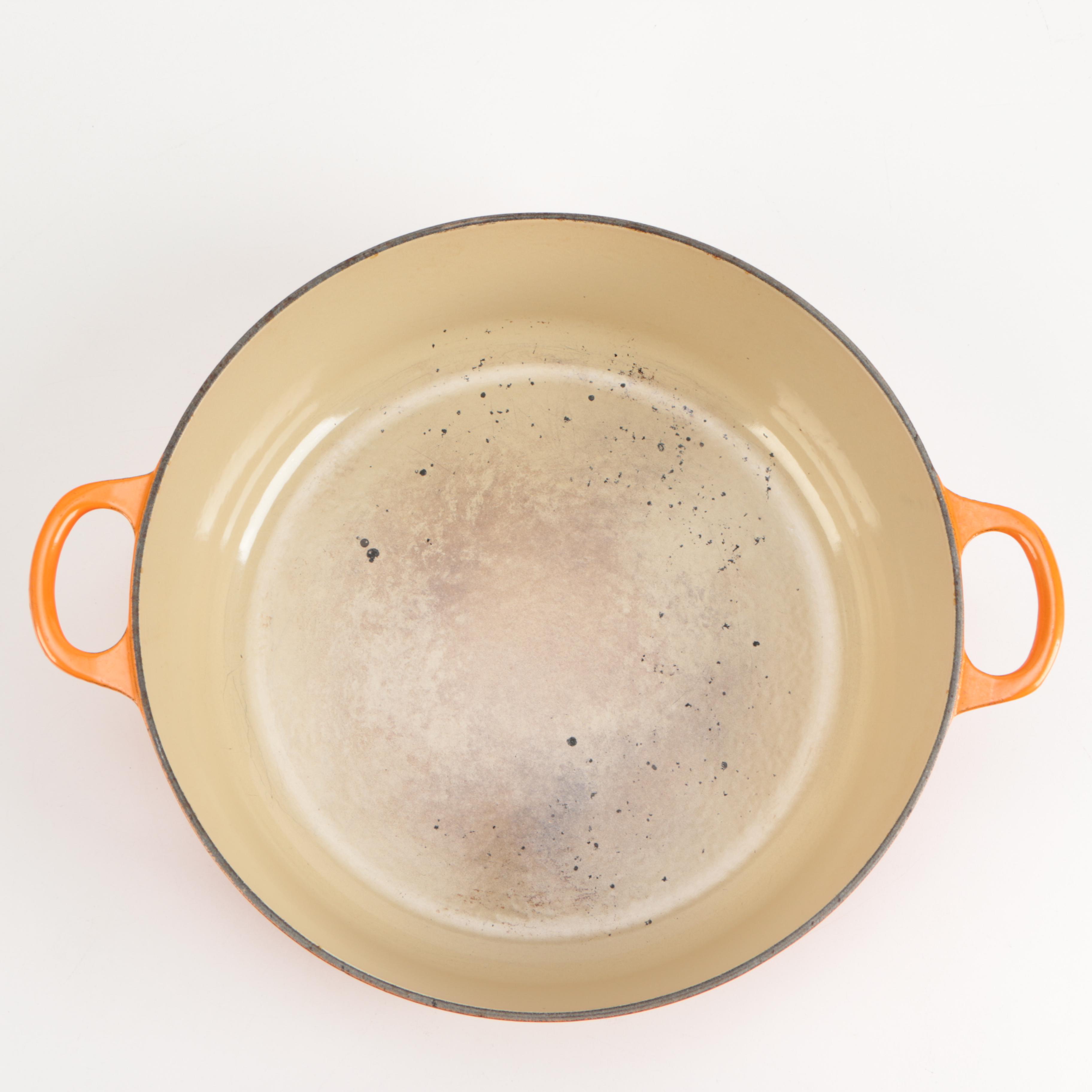 Pair of Le Creuset Orange Enamel Dutch Ovens