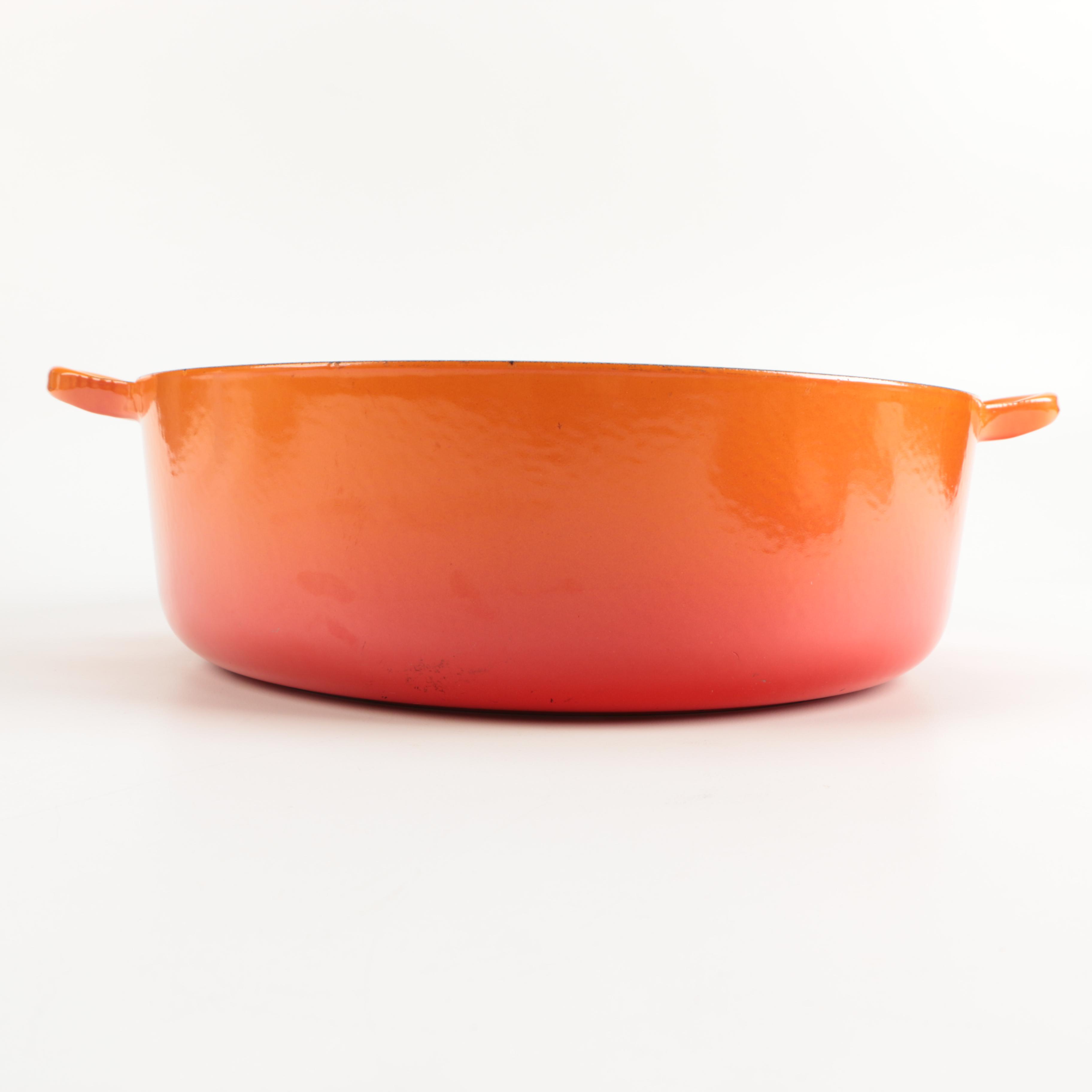 Pair of Le Creuset Orange Enamel Dutch Ovens