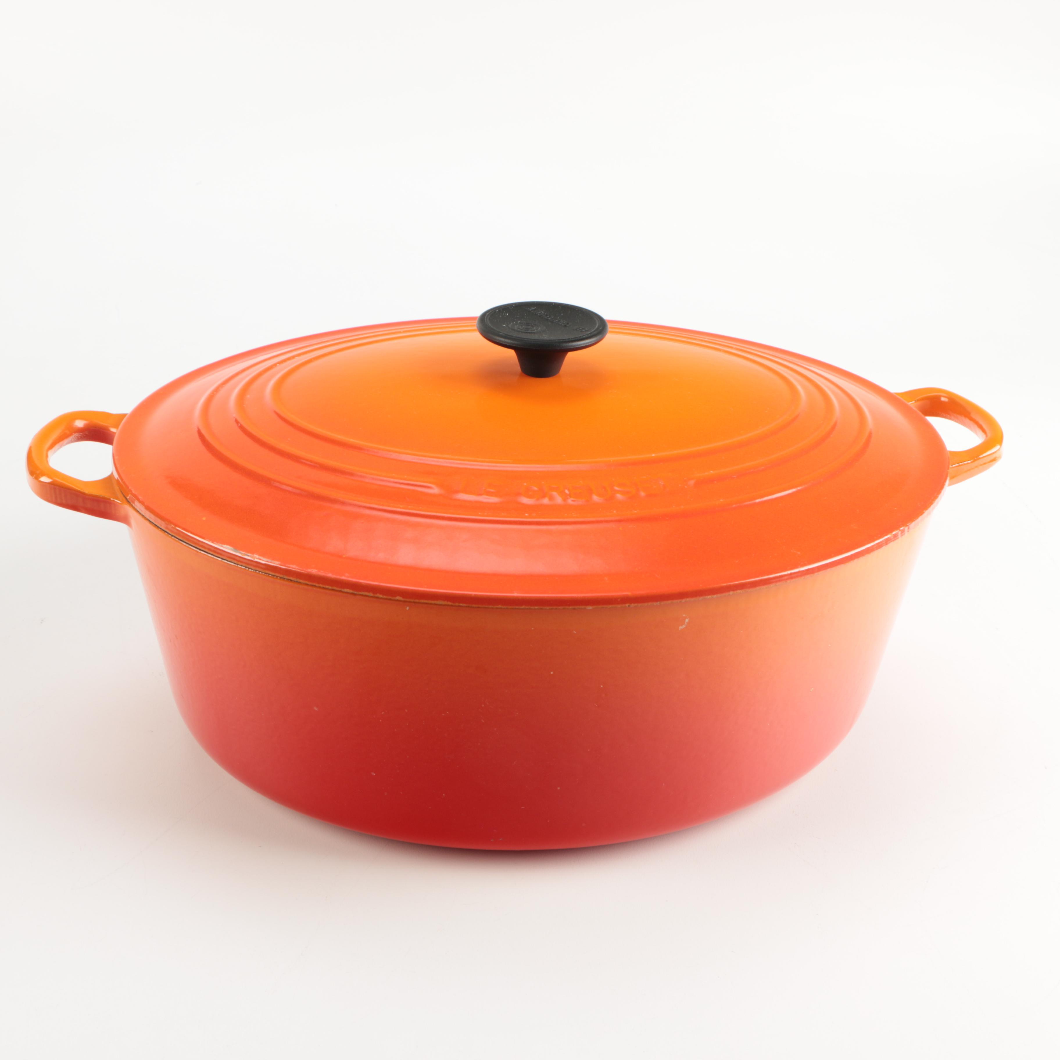 Pair of Le Creuset Orange Enamel Dutch Ovens