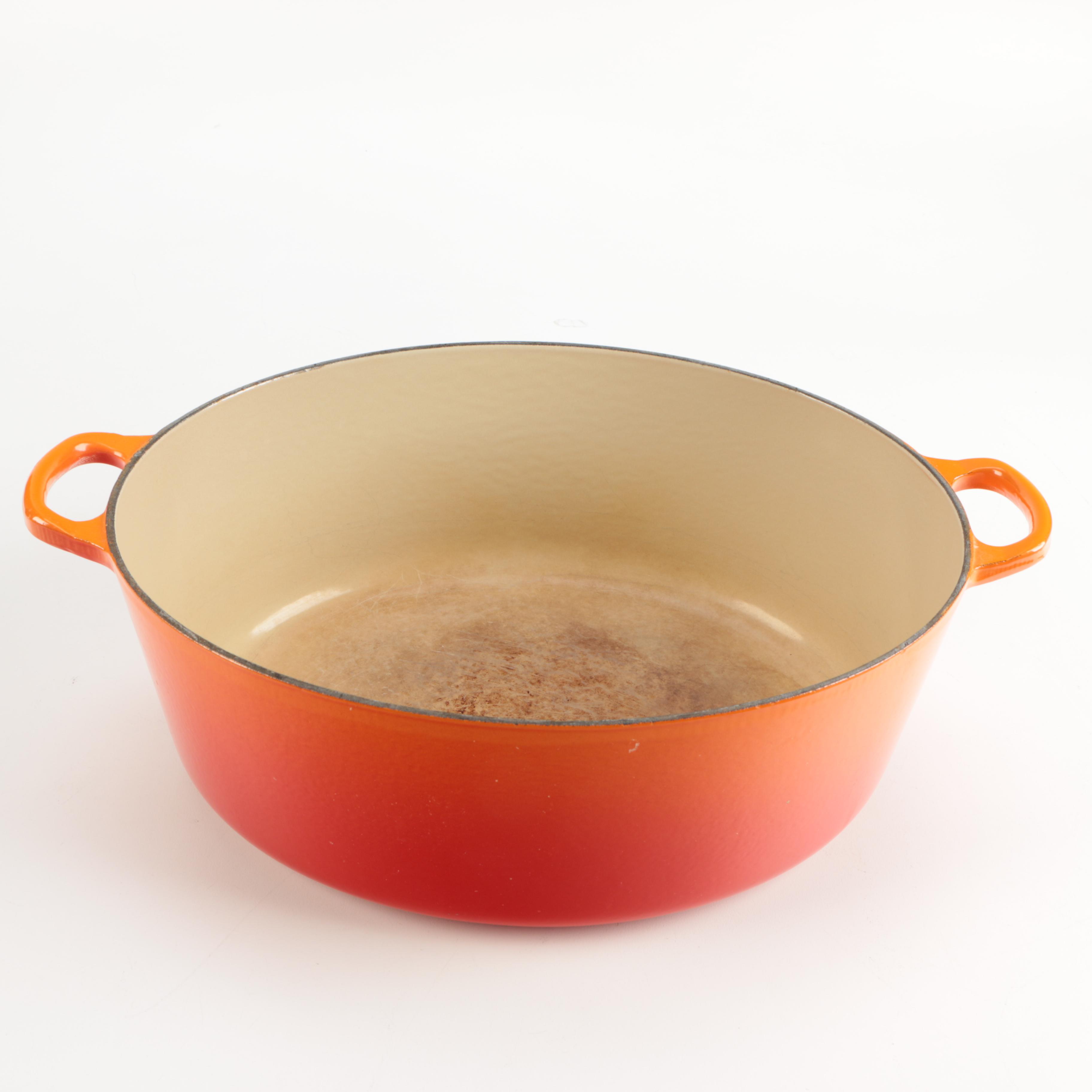 Pair of Le Creuset Orange Enamel Dutch Ovens