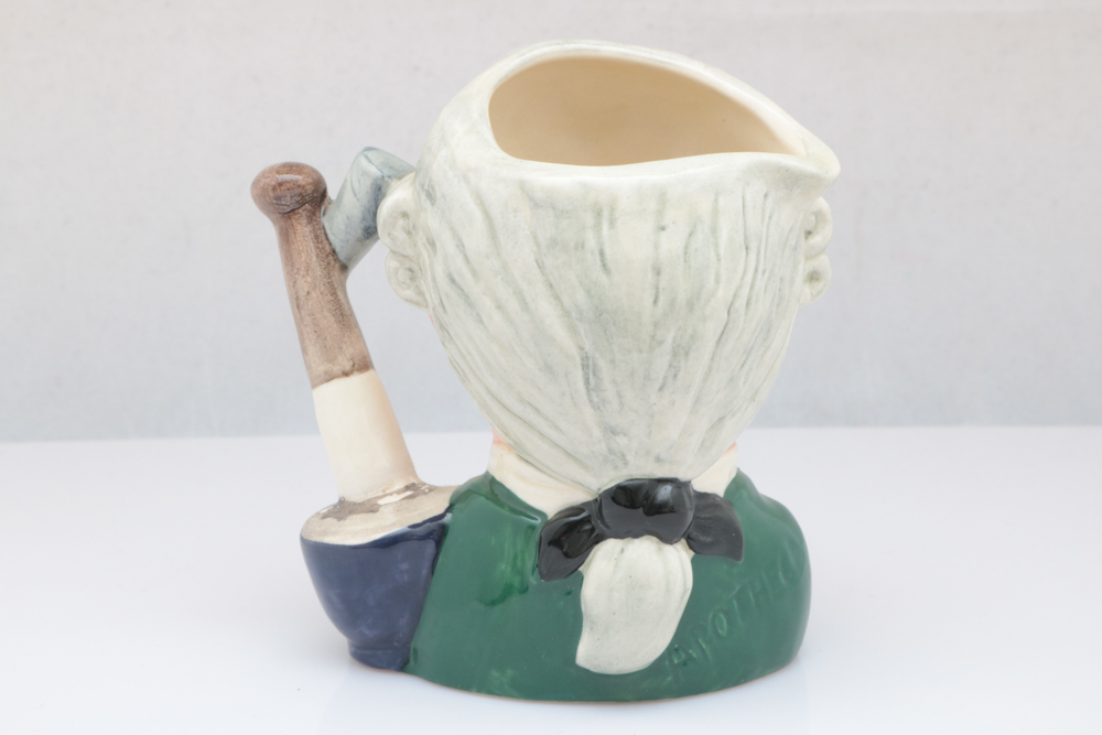 Collection of  Royal Doulton Toby and Character Mugs