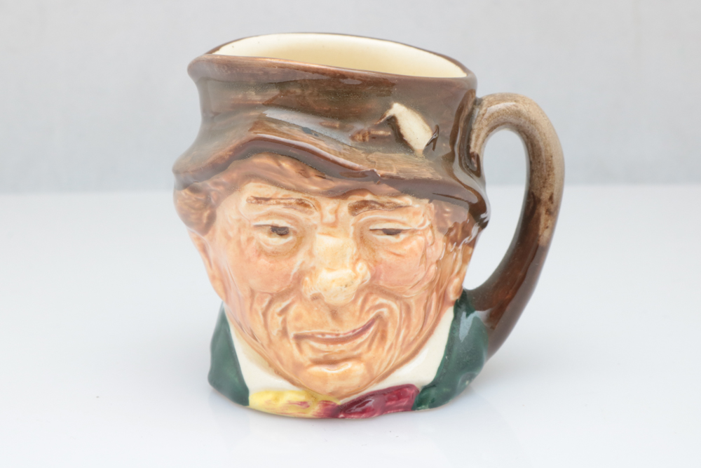 Collection of  Royal Doulton Toby and Character Mugs