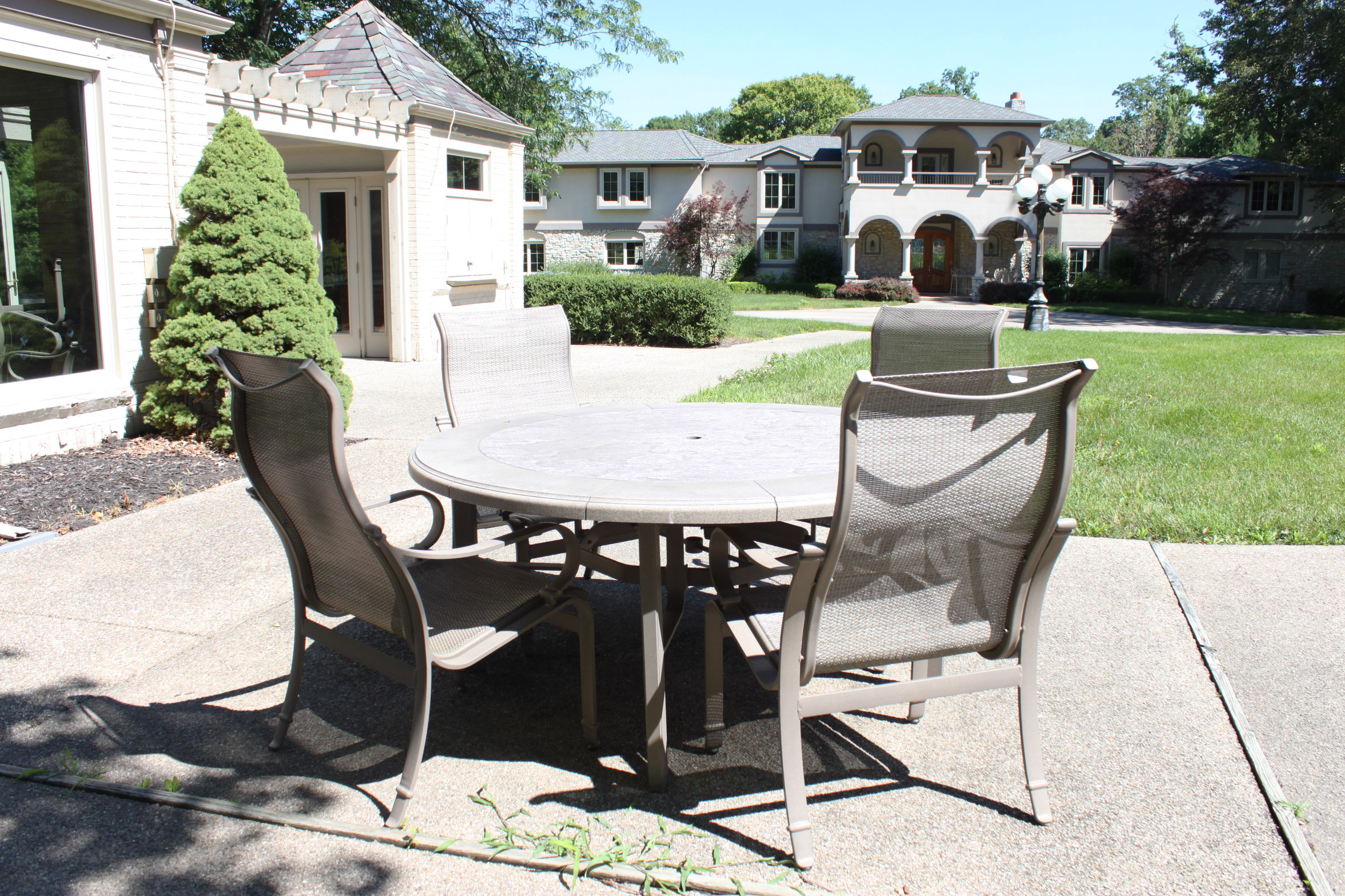 Tropitone Stoneworks Collection Patio Table and Chairs