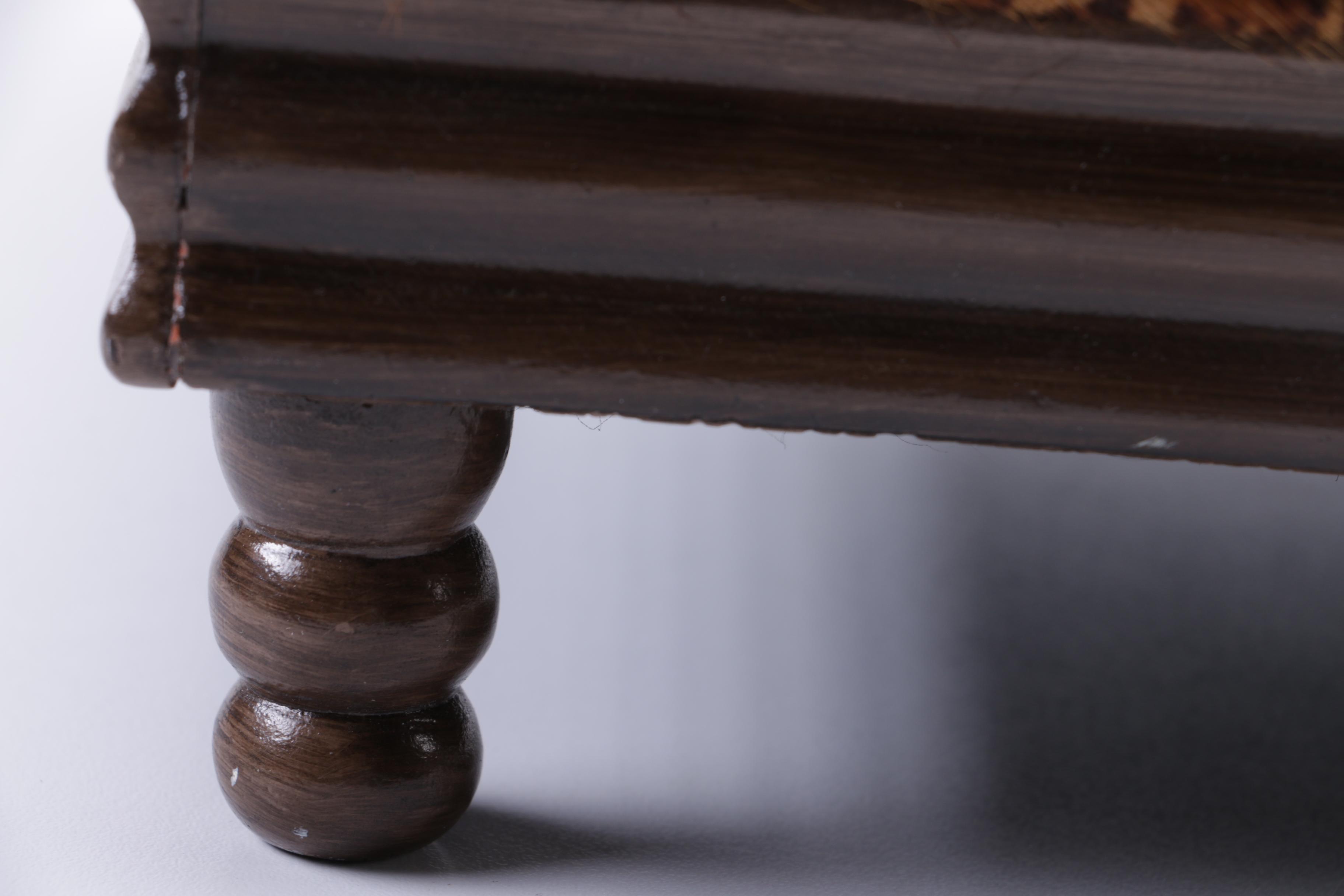 Upholstered Leopard Print Ottoman