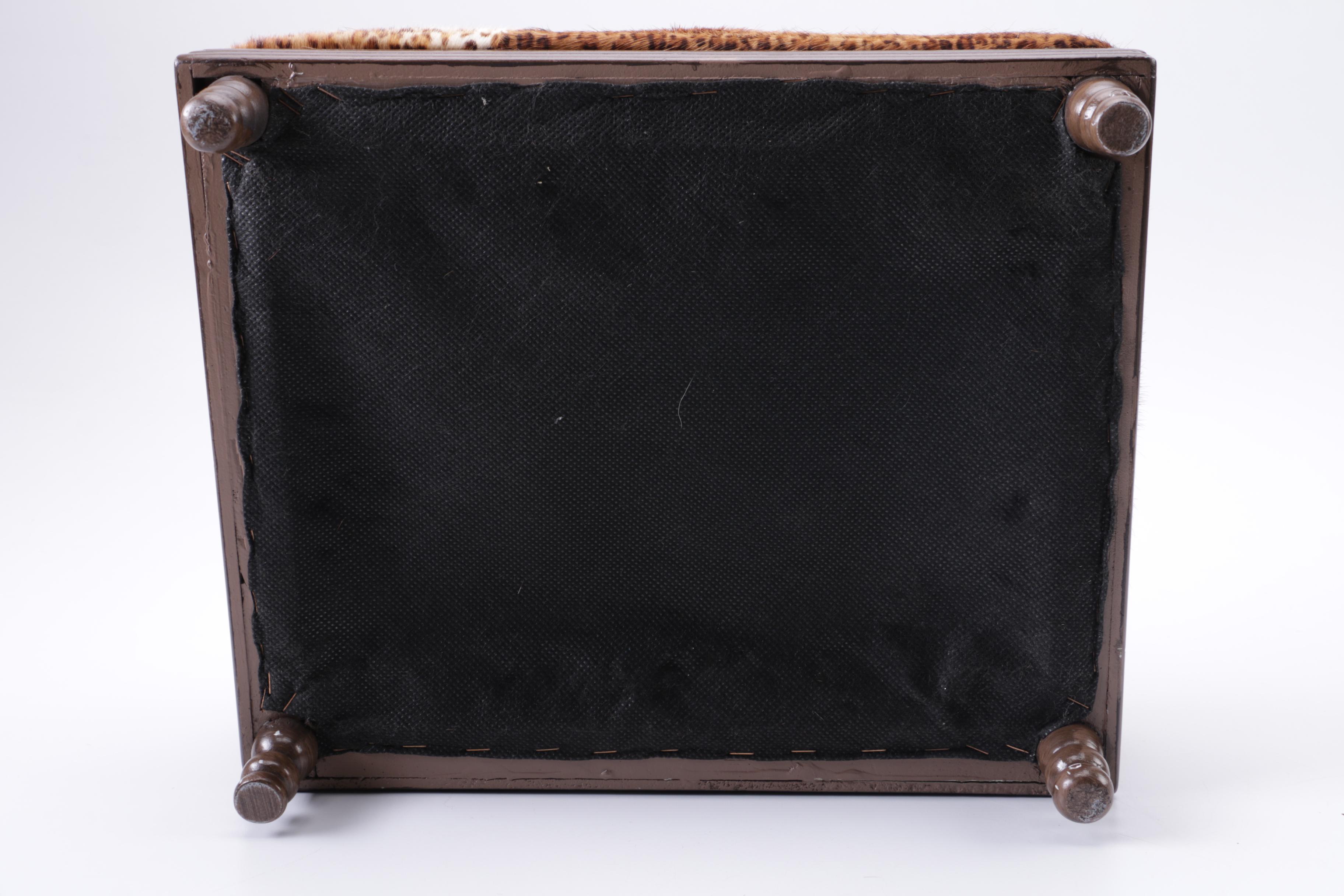 Upholstered Leopard Print Ottoman