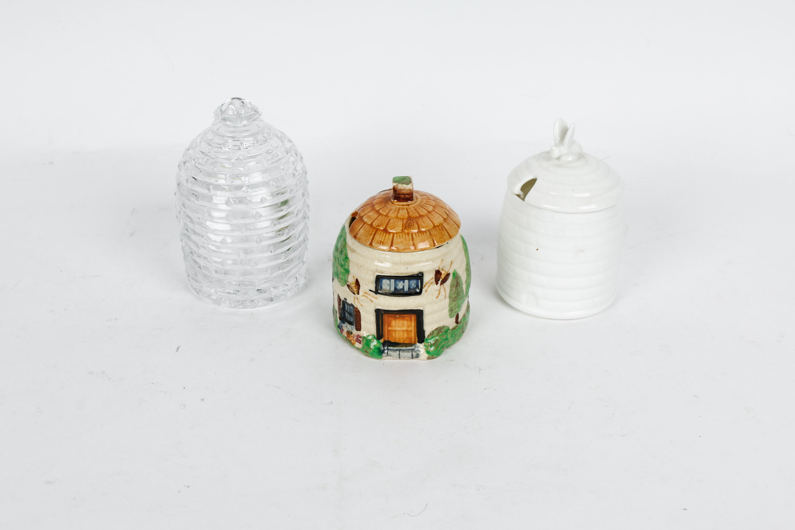 Collection of Three Honey Containers