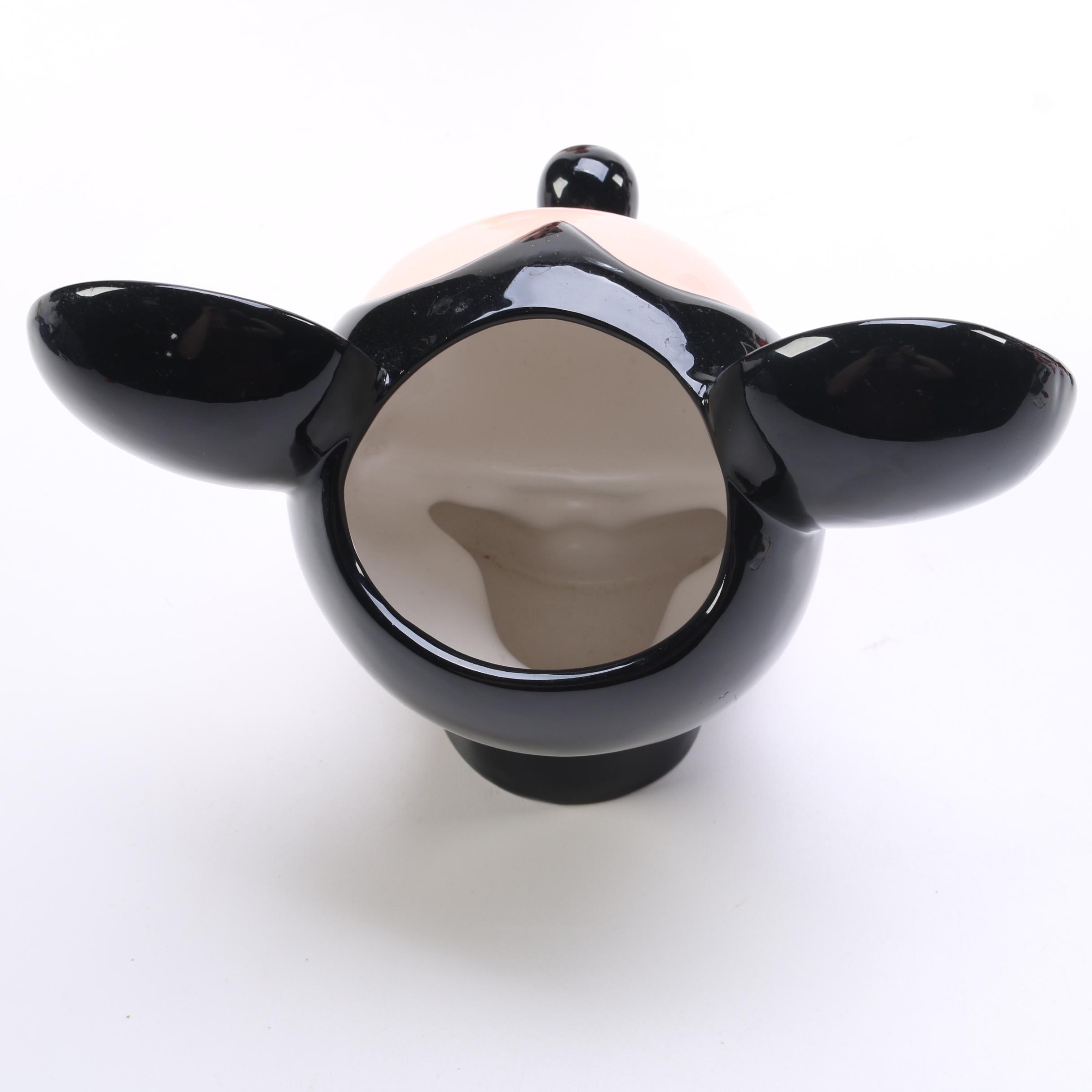 Disney Figurines Including "The Little Mermaid" and "Mickey Mouse"