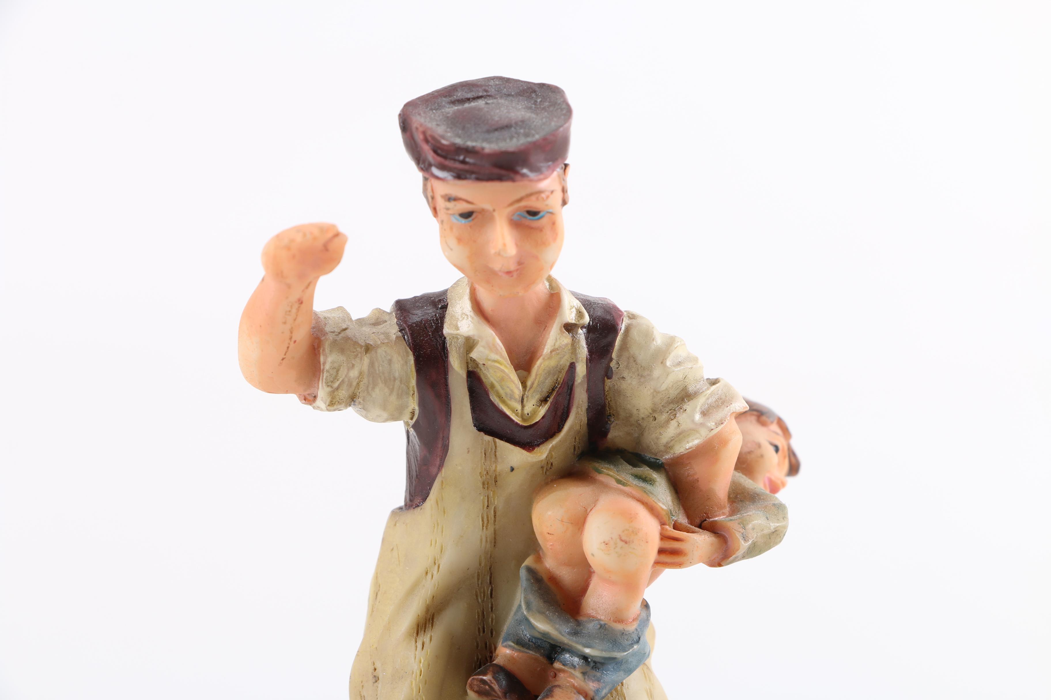 Spanking Father Figurine