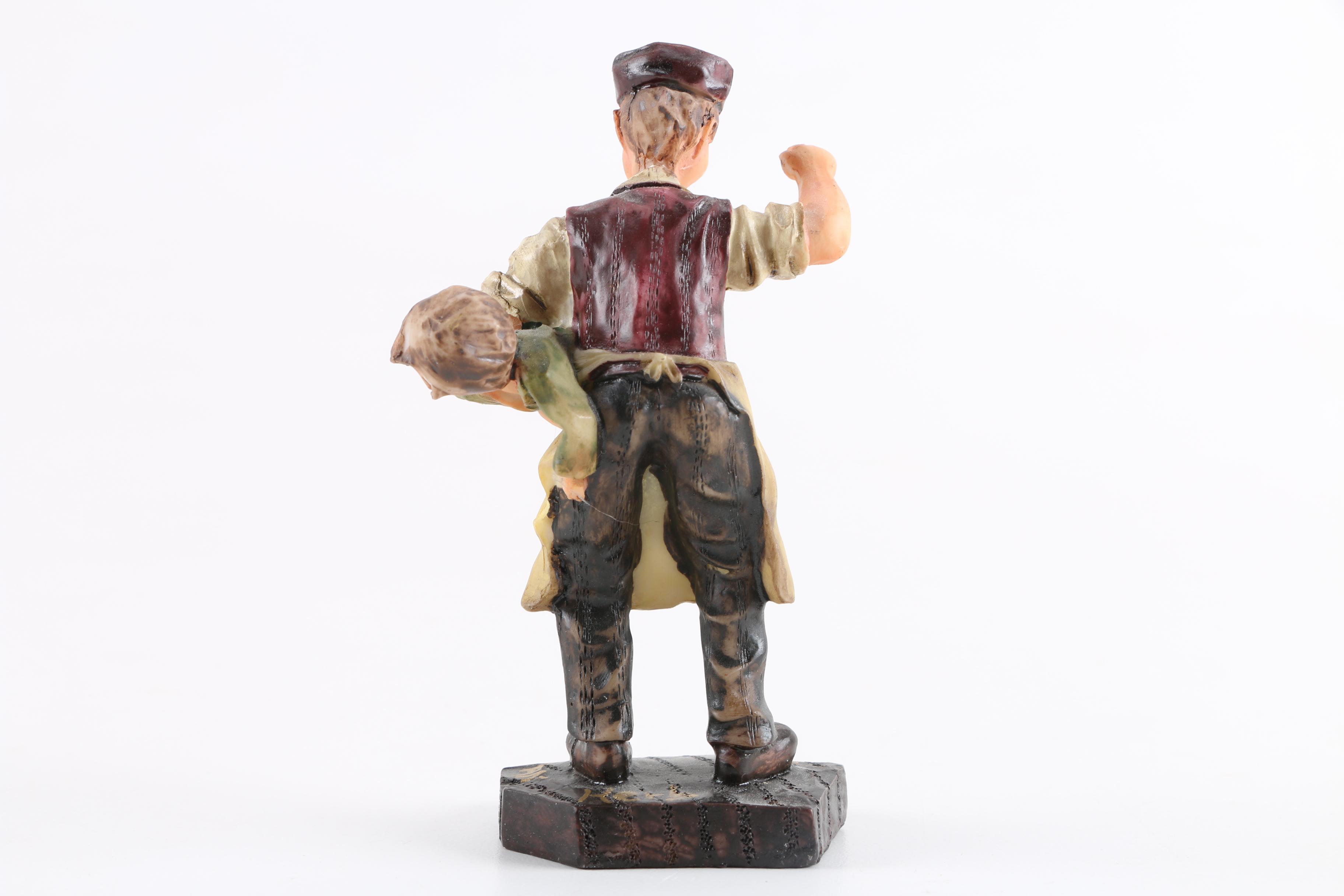 Spanking Father Figurine
