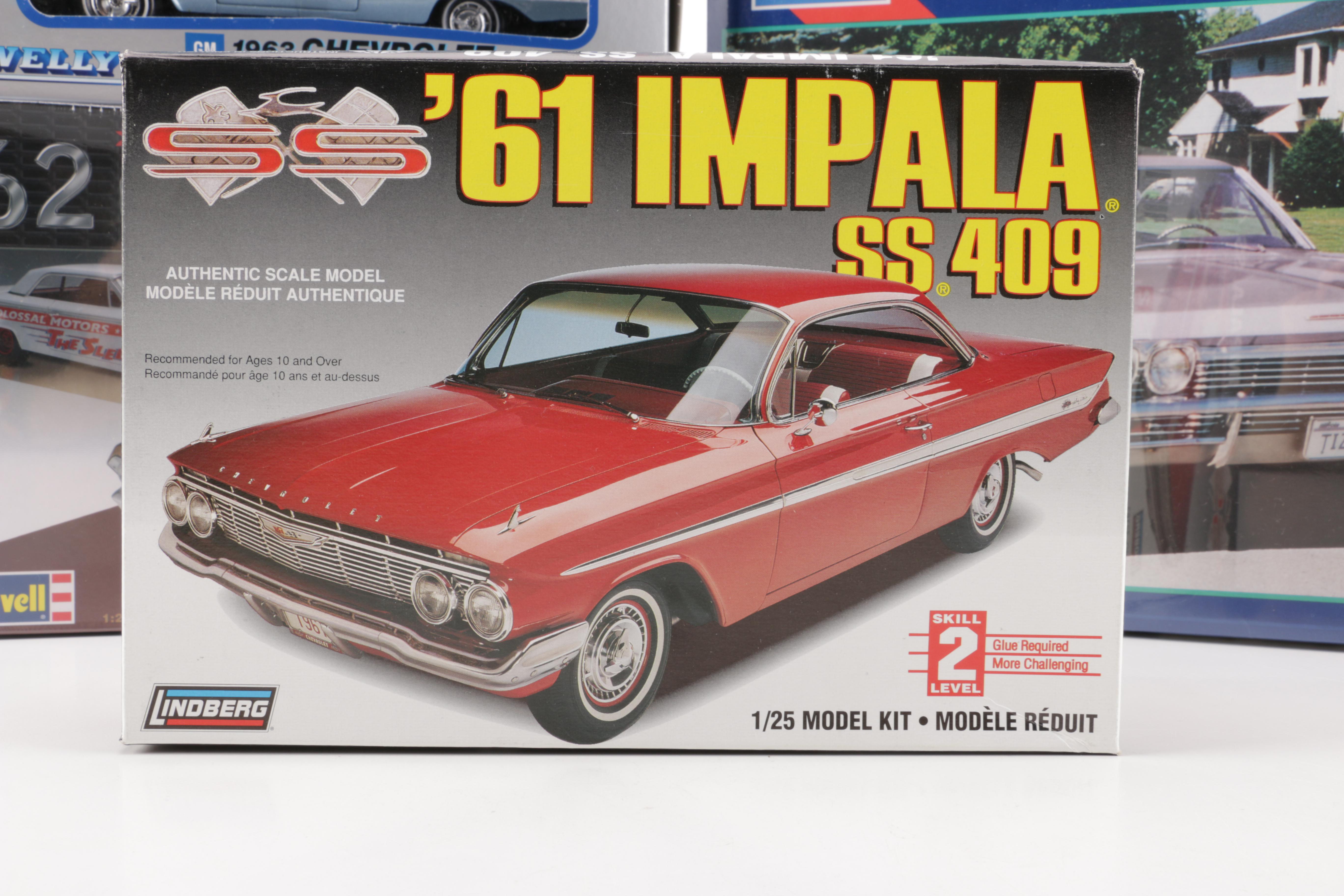 Assortment of Chevy Impala Model Kits and Die-Cast Cars
