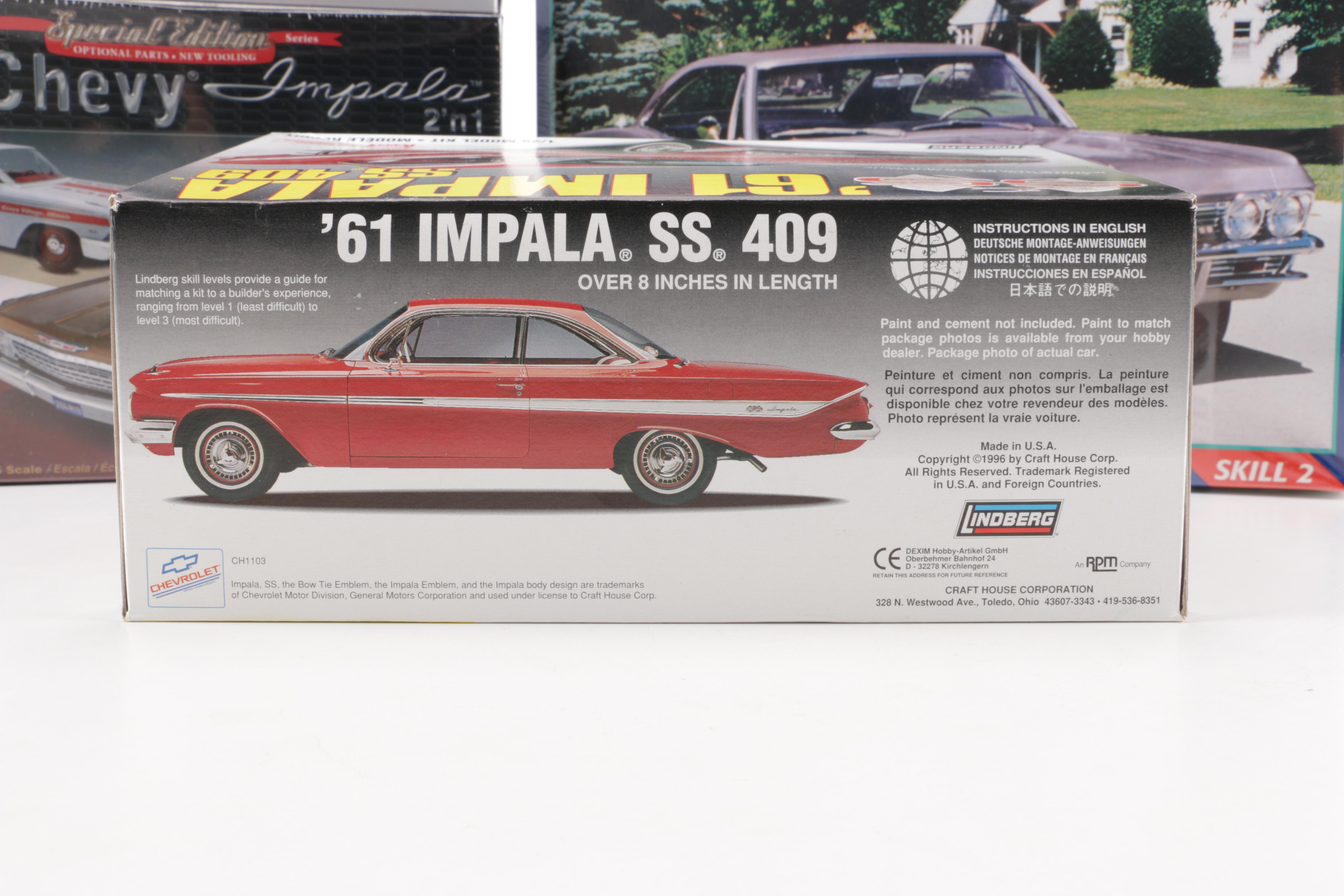 Assortment of Chevy Impala Model Kits and Die-Cast Cars