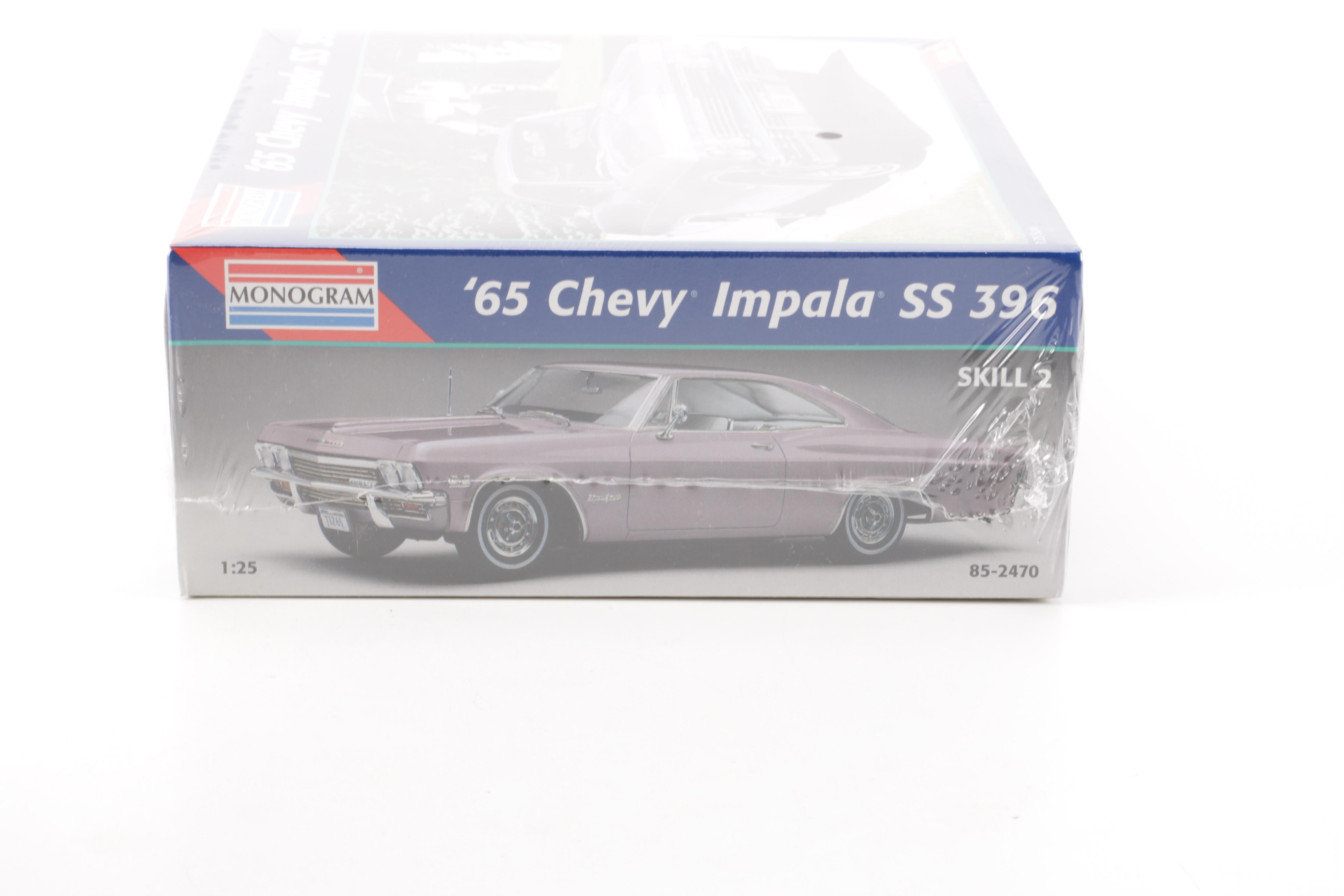 Assortment of Chevy Impala Model Kits and Die-Cast Cars