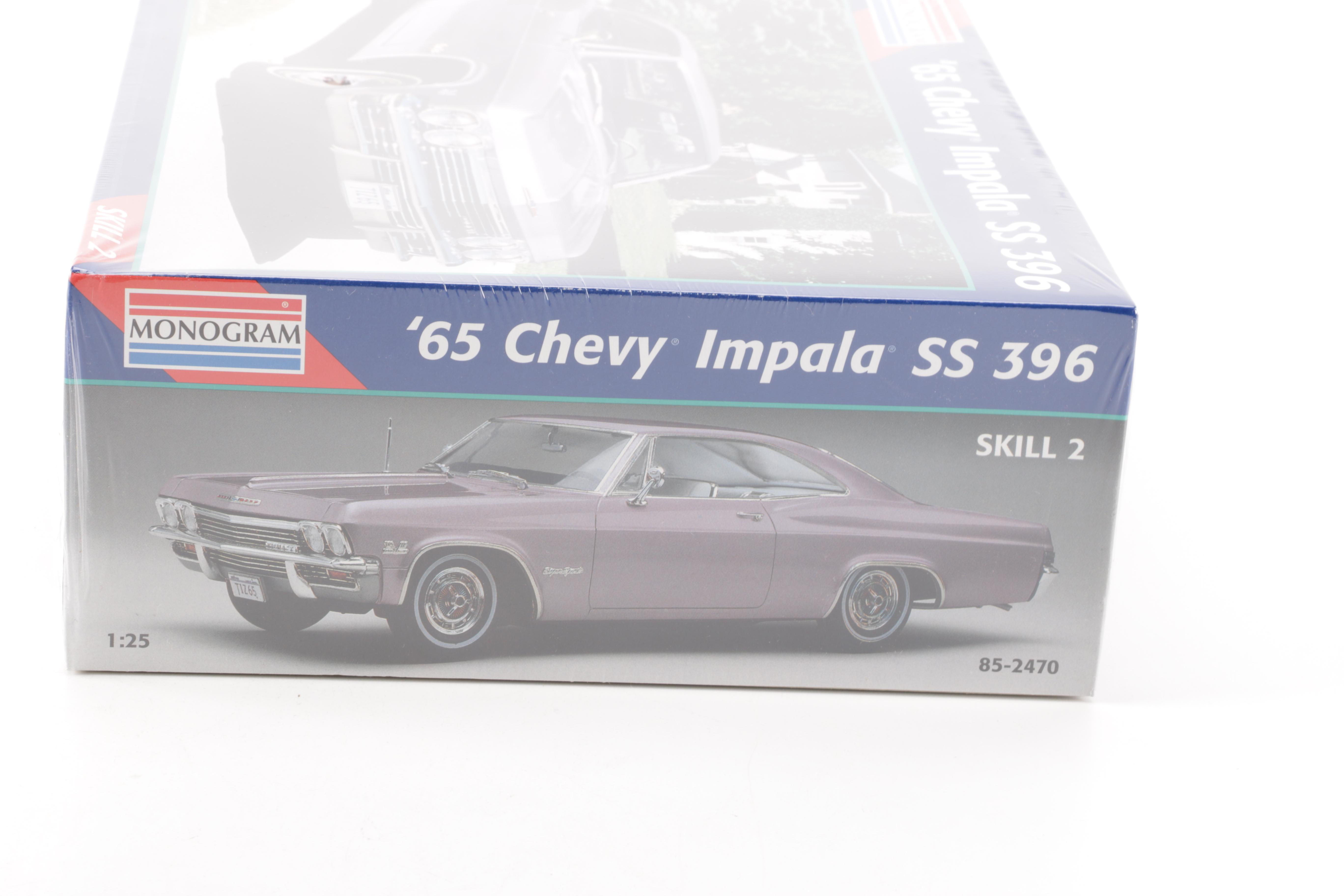 Assortment of Chevy Impala Model Kits and Die-Cast Cars