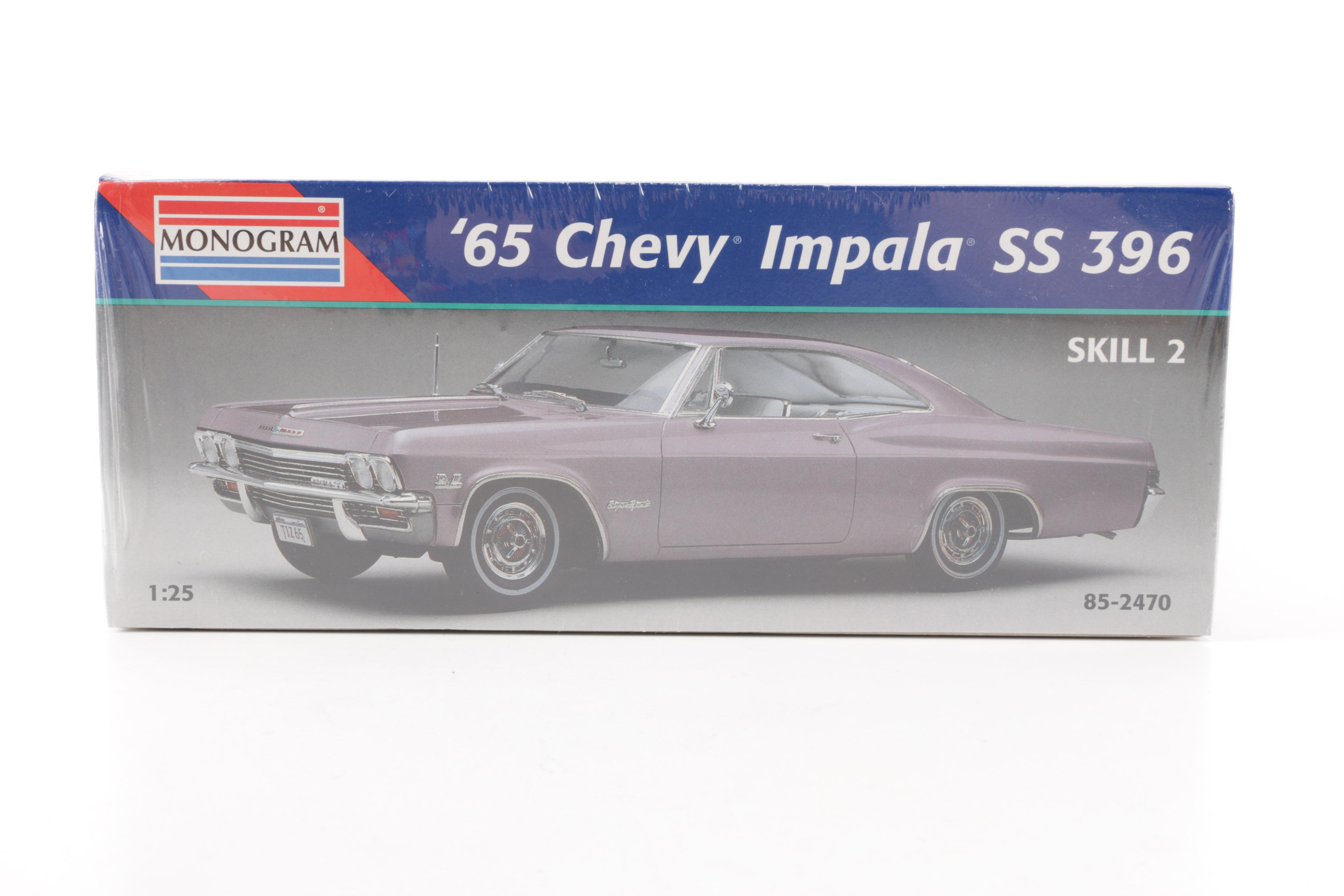 Assortment of Chevy Impala Model Kits and Die-Cast Cars