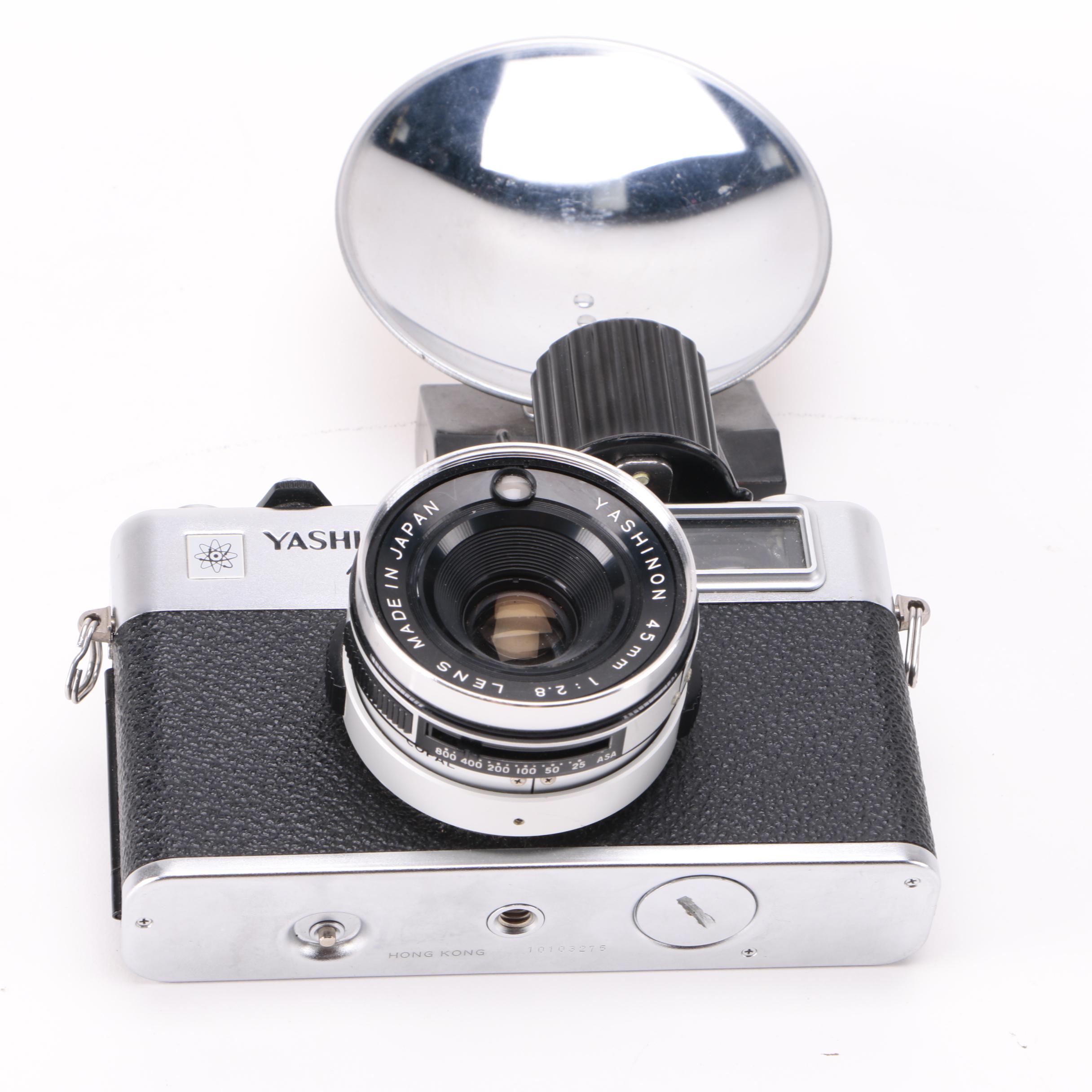 Yashica 35MM Film Camera and "Ansel Adams: 400 Photographs" Book