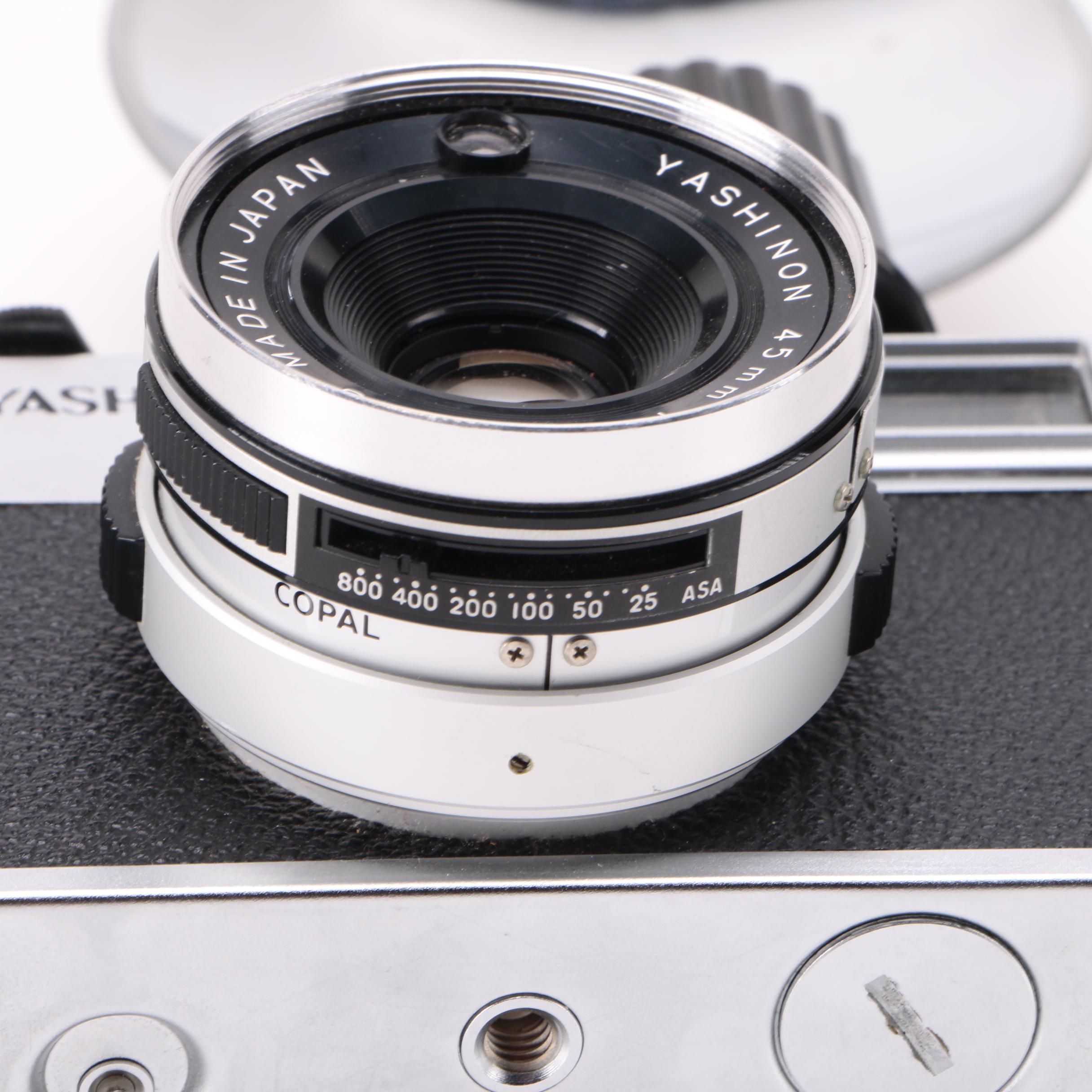 Yashica 35MM Film Camera and "Ansel Adams: 400 Photographs" Book