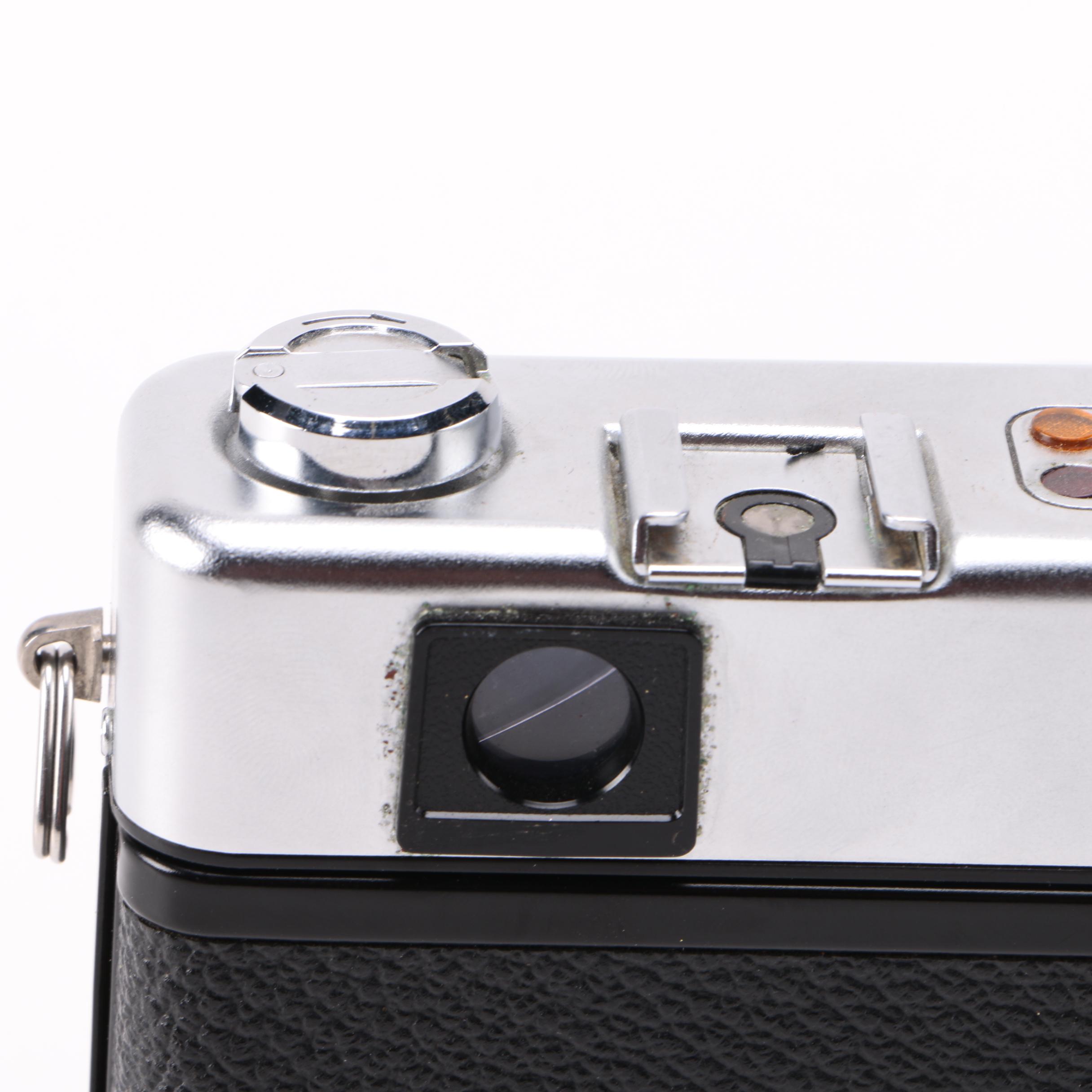 Yashica 35MM Film Camera and "Ansel Adams: 400 Photographs" Book