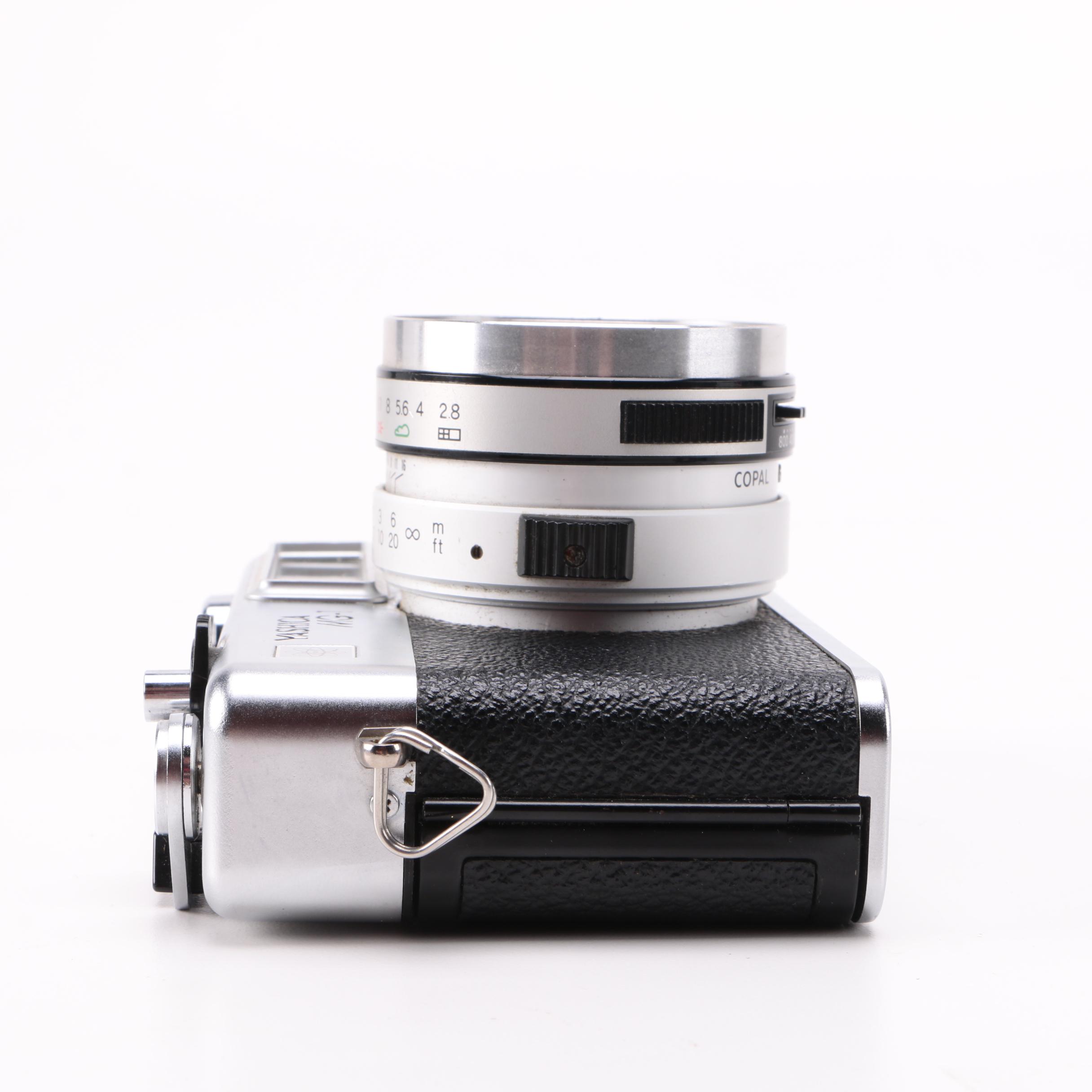 Yashica 35MM Film Camera and "Ansel Adams: 400 Photographs" Book