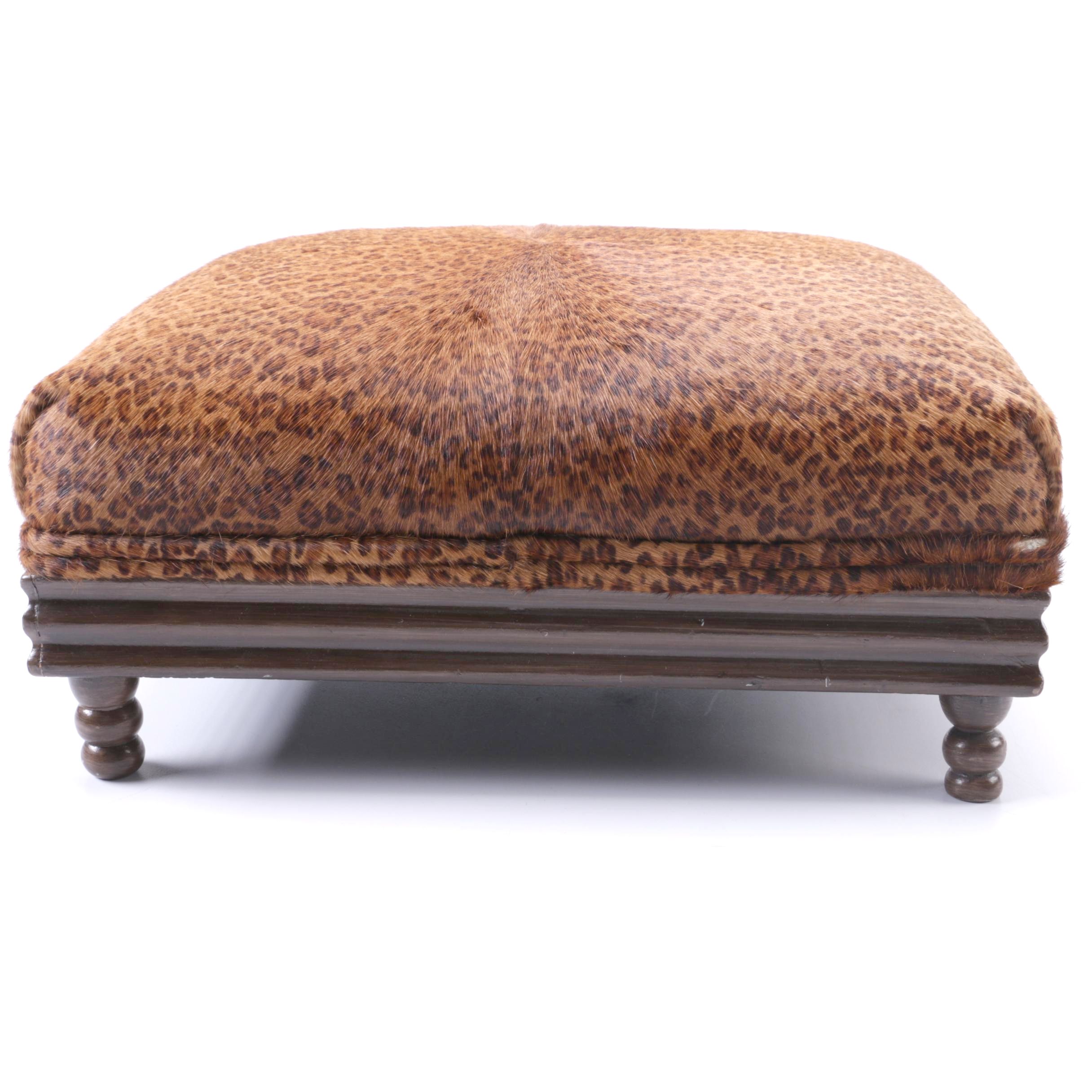 Upholstered Leopard Print Ottoman